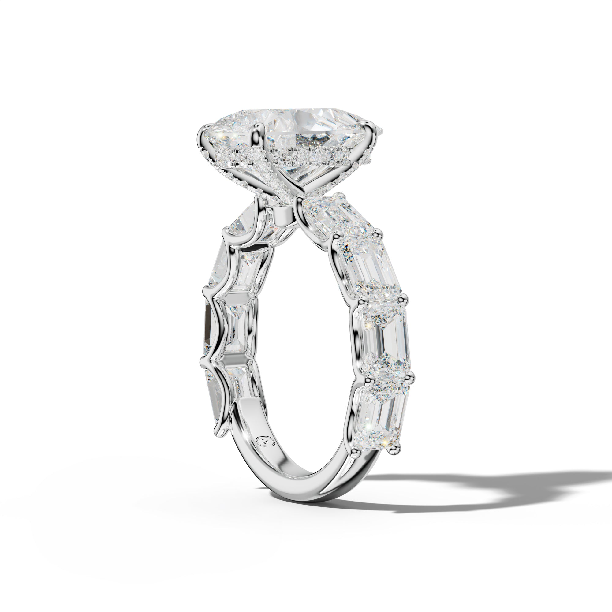 Oaklynn Pear Shape Engagement Ring With East West Emerald Side Stones