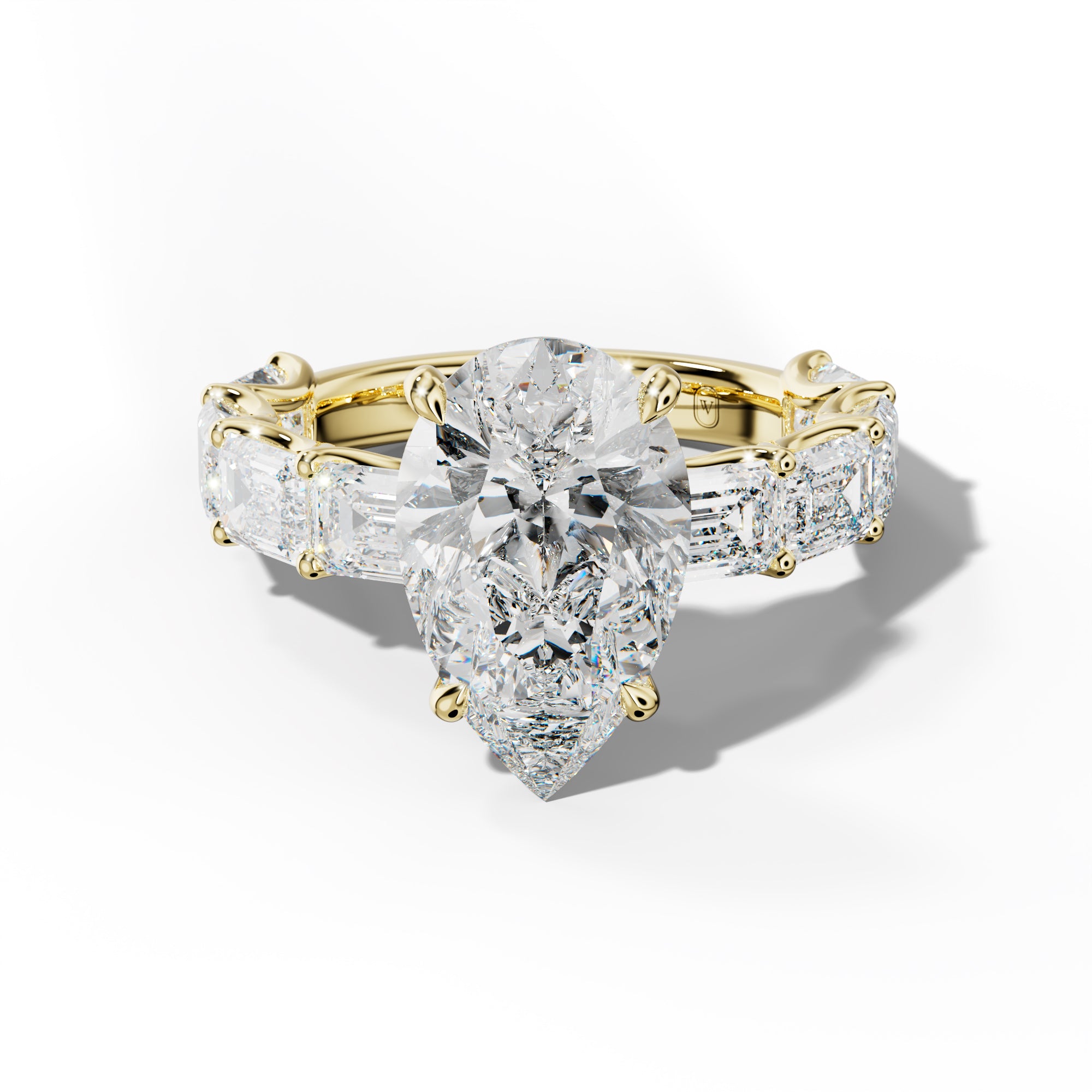 Oaklynn Pear Shape Engagement Ring With East West Emerald Side Stones