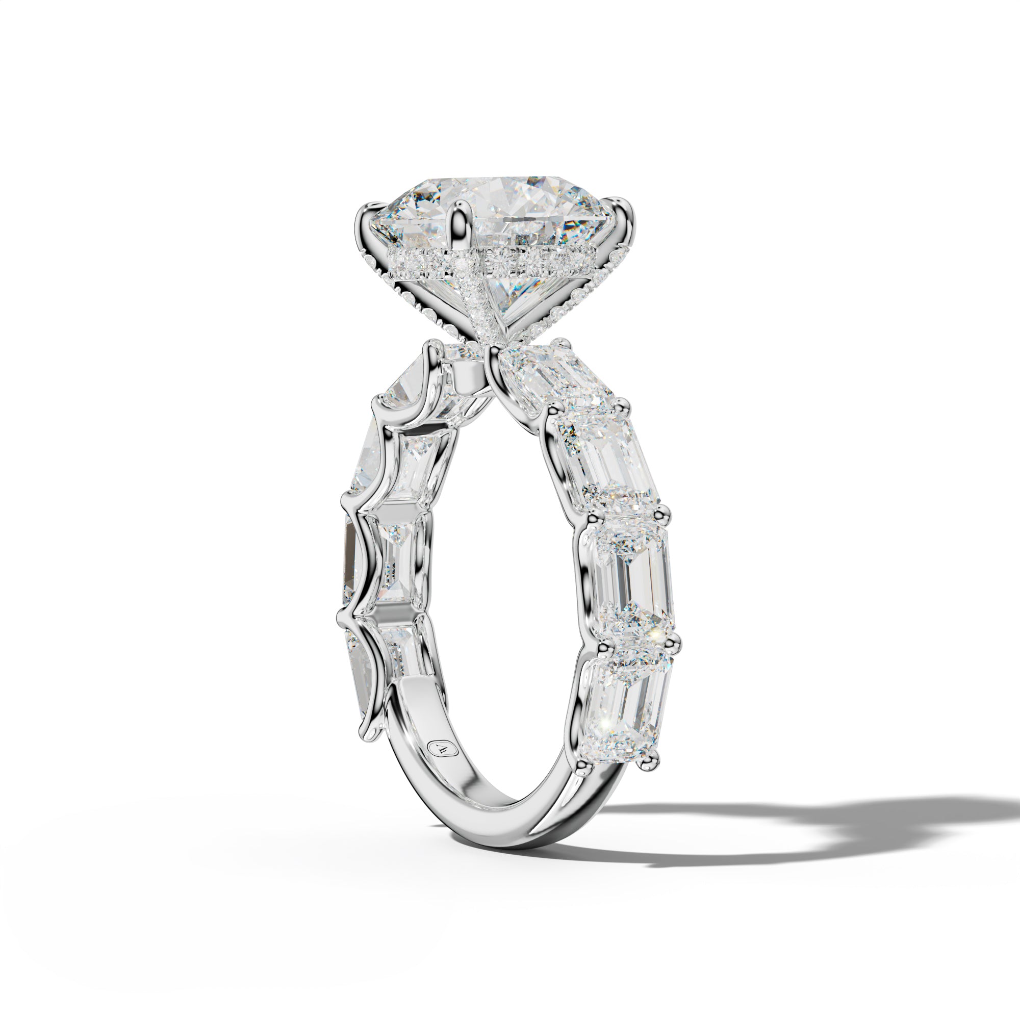 Oaklynn Round Diamond Engagement Ring With East West Emerald Side Stones