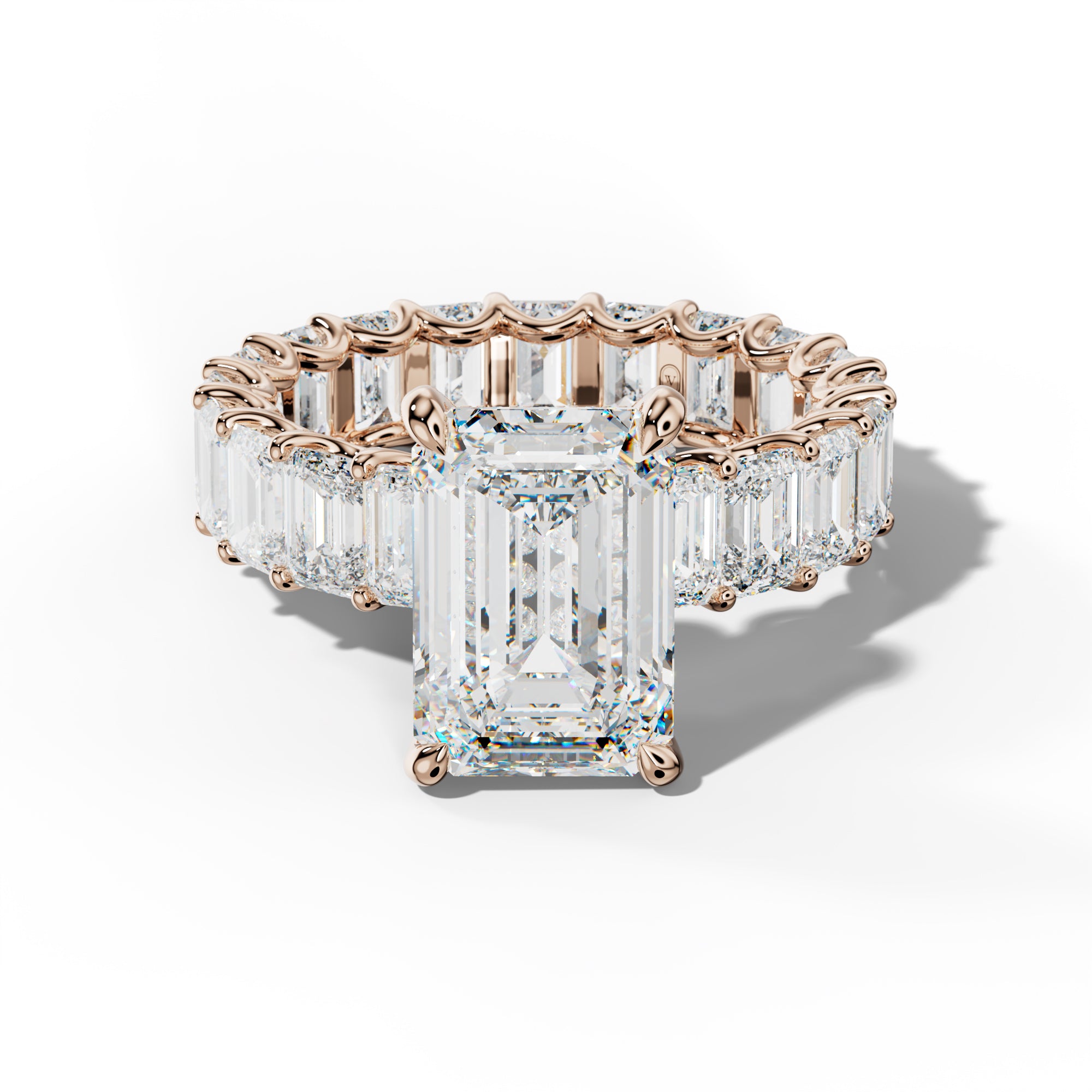 Seraphina Emerald Cut Engagement Ring With Emerald Side Stones