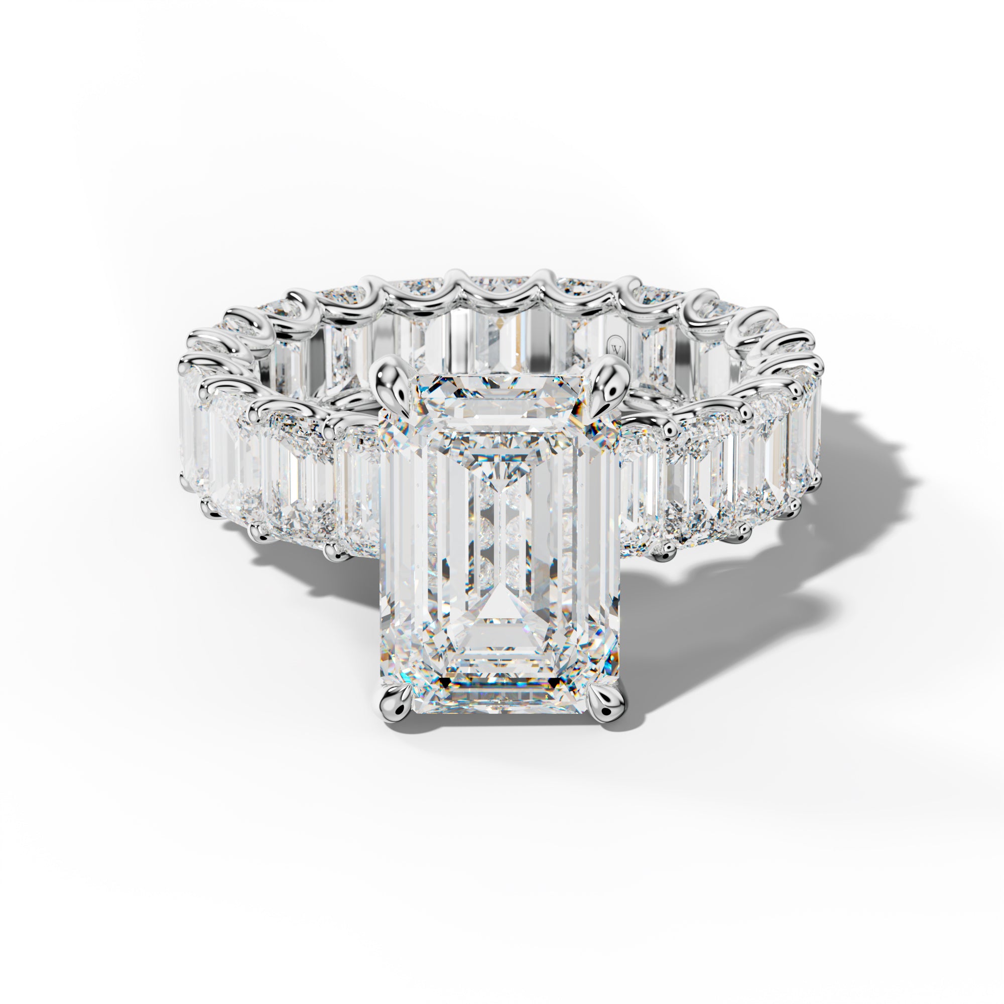Seraphina Emerald Cut Engagement Ring With Emerald Side Stones