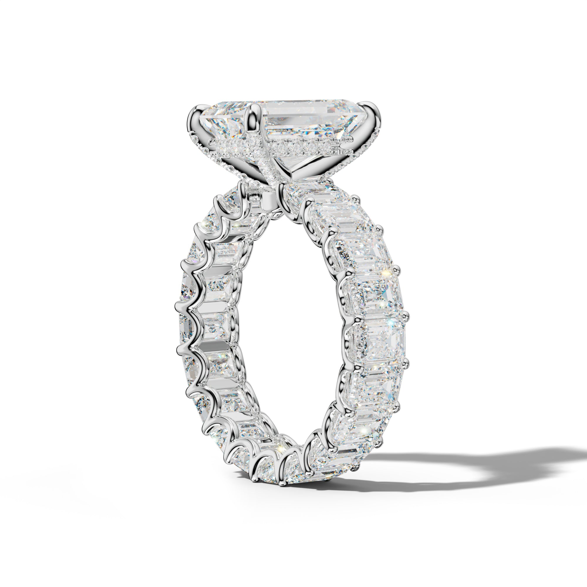 Seraphina Emerald Cut Engagement Ring With Emerald Side Stones