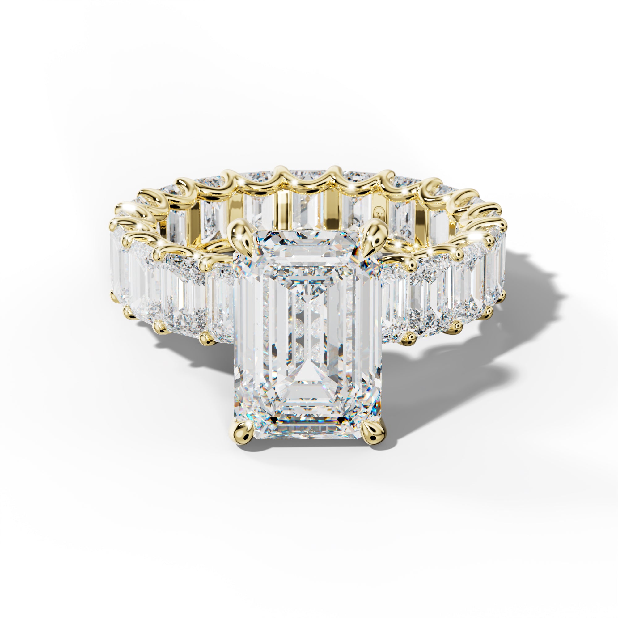 Seraphina Emerald Cut Engagement Ring With Emerald Side Stones