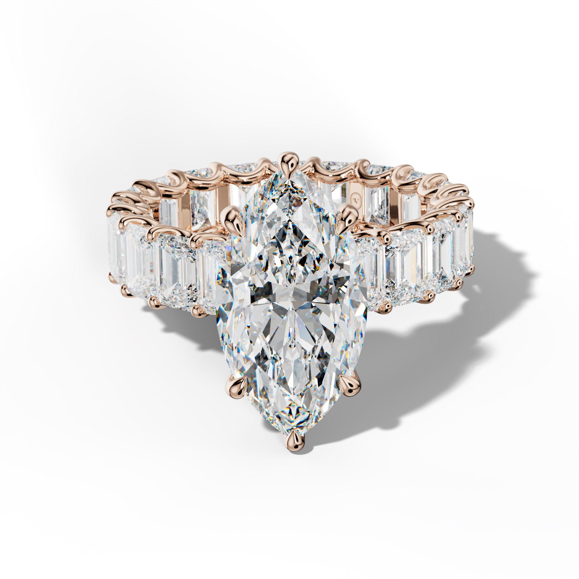 Seraphina Marquise Diamond Engagement Ring With Emerald Side Stones