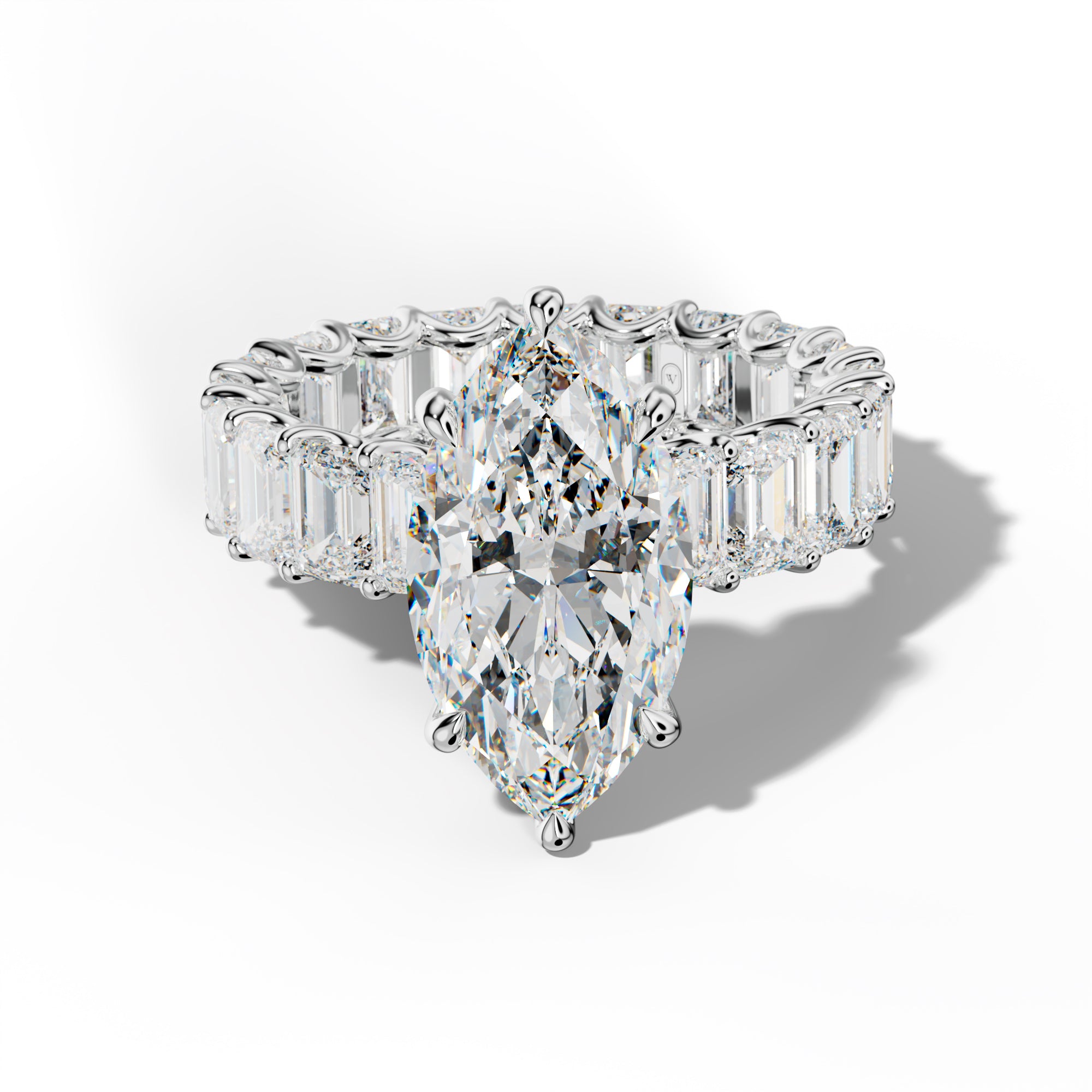 Seraphina Marquise Diamond Engagement Ring With Emerald Side Stones