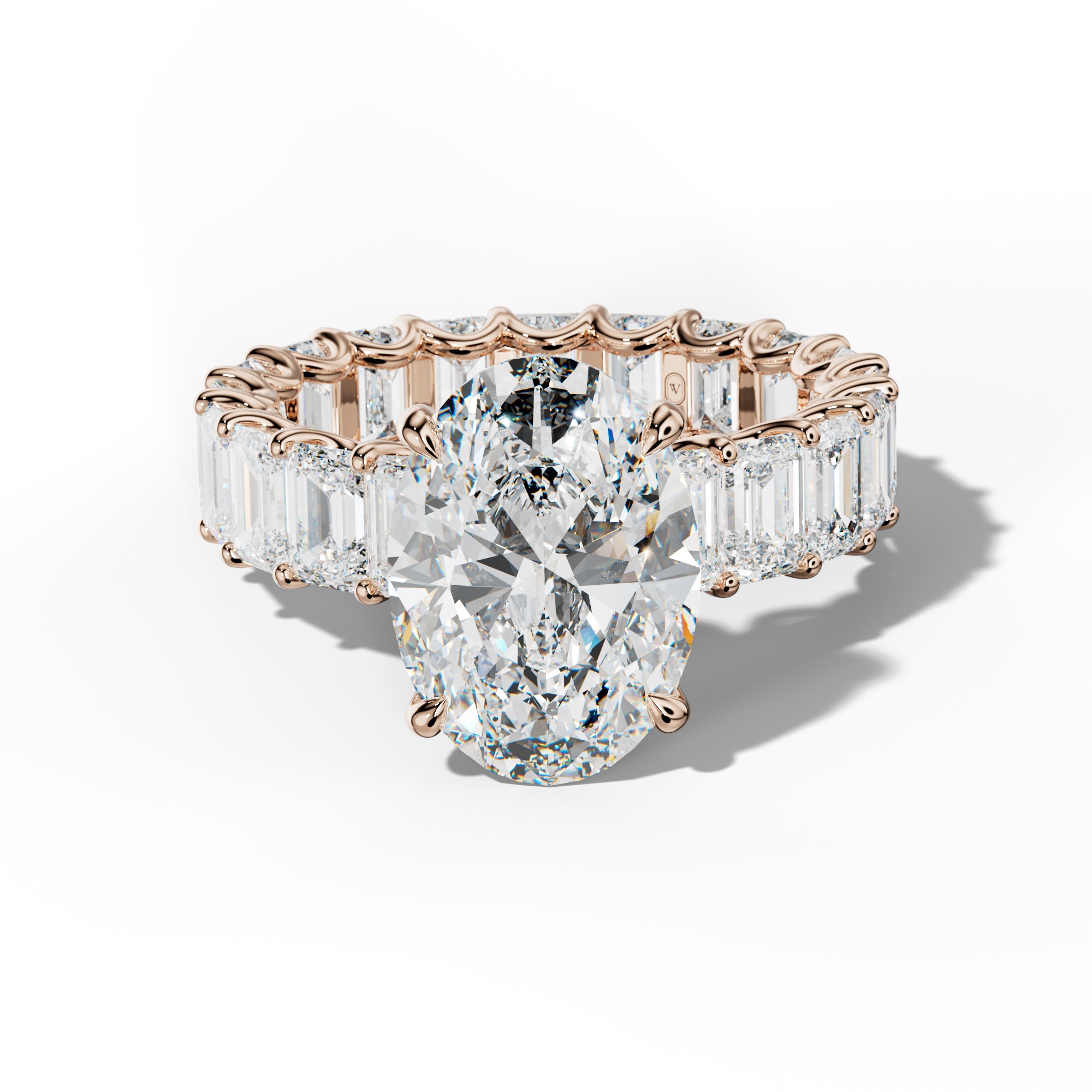 Seraphina Oval Diamond Engagement Ring With Emerald Side Stones