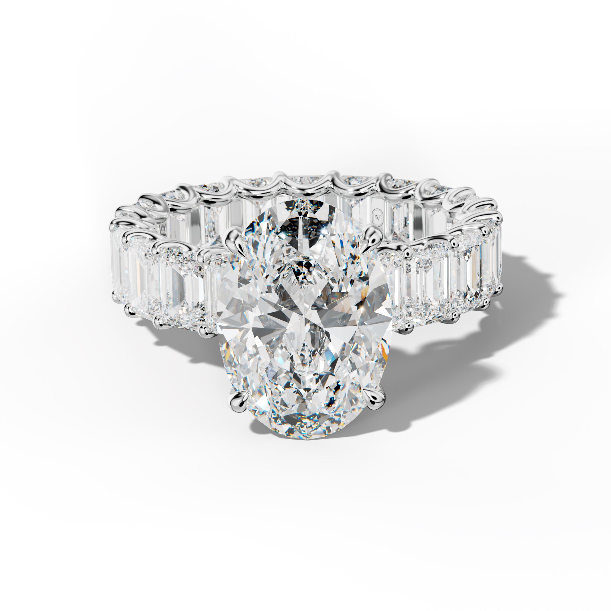 Seraphina Oval Diamond Engagement Ring With Emerald Side Stones