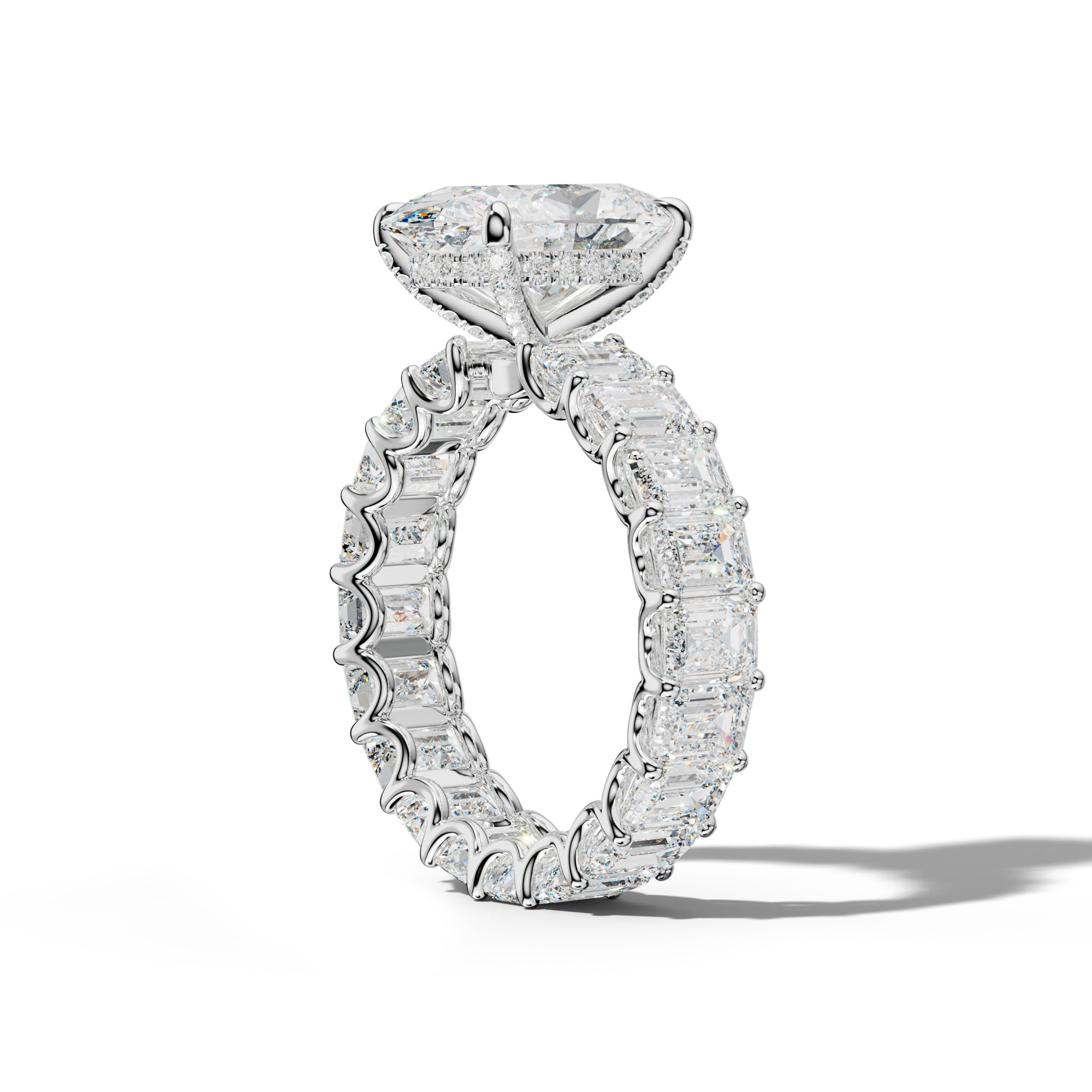 Seraphina Oval Diamond Engagement Ring With Emerald Side Stones