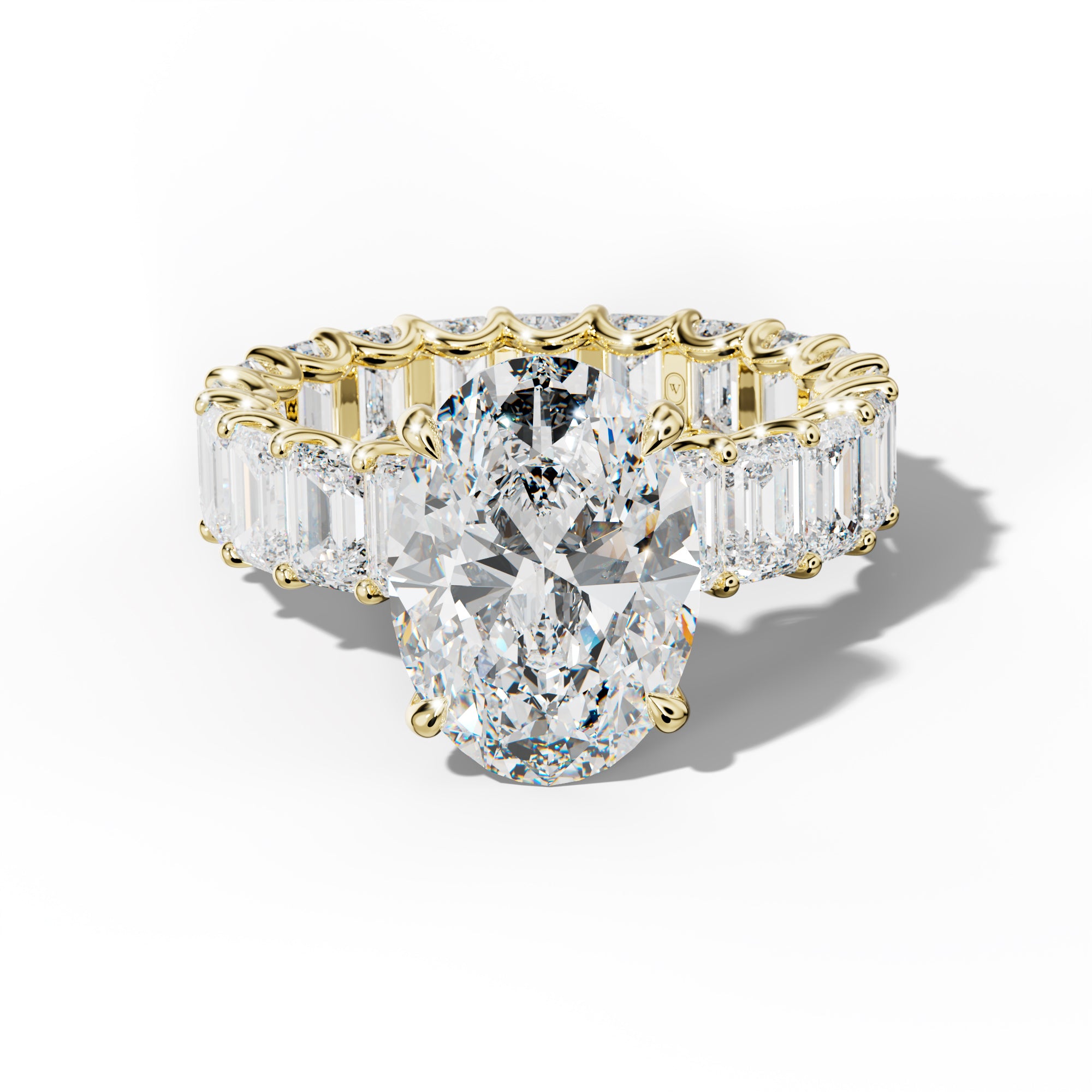 Seraphina Oval Diamond Engagement Ring With Emerald Side Stones