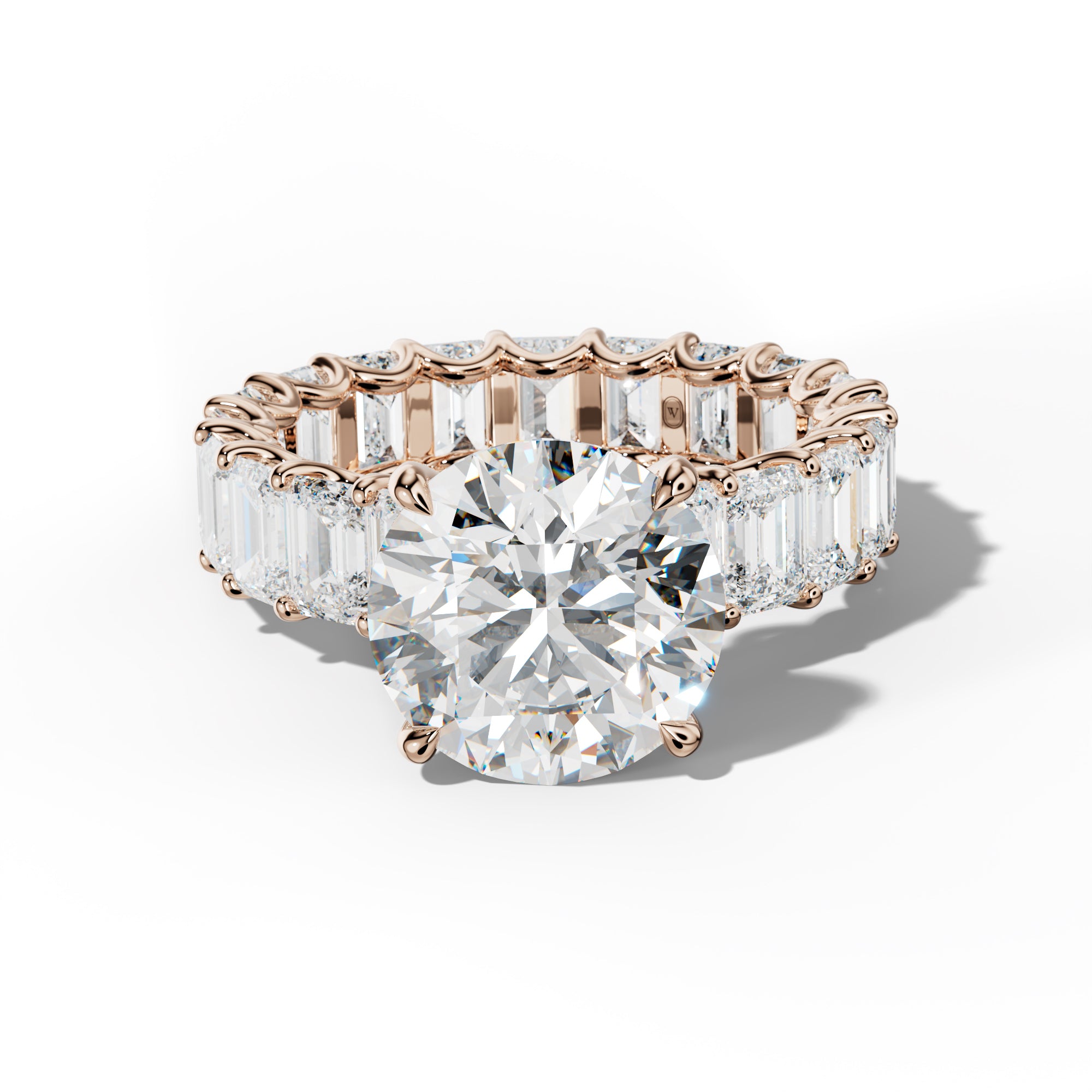 Seraphina Round Diamond Engagement Ring With Emerald Side Stones