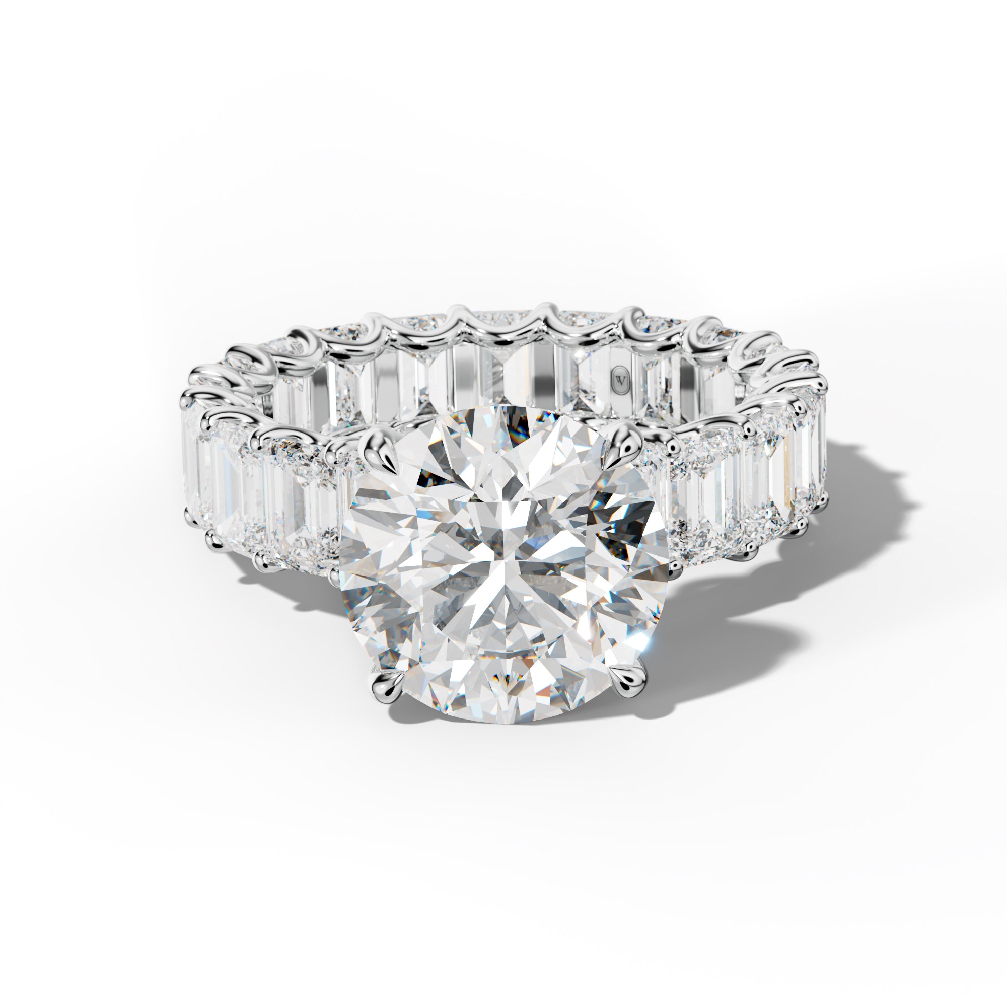 Seraphina Round Diamond Engagement Ring With Emerald Side Stones