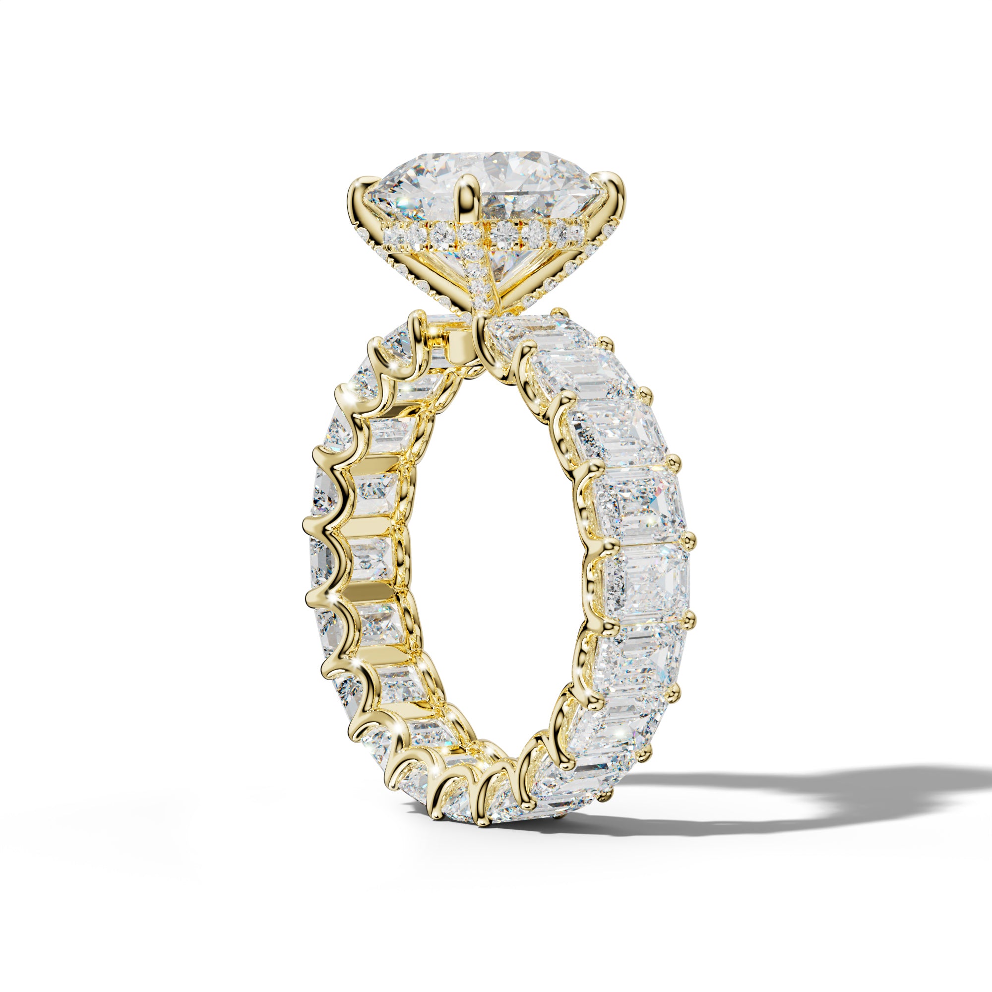 Seraphina Round Diamond Engagement Ring With Emerald Side Stones
