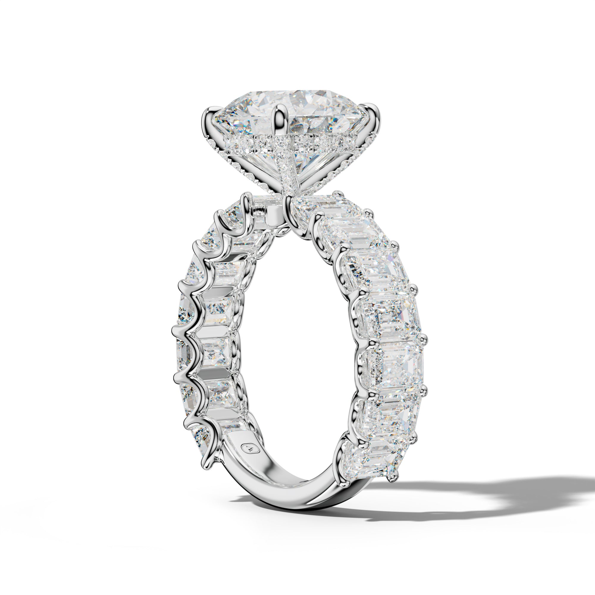 Vivienne Round Diamond  Engagement Ring With Emerald Side Stones