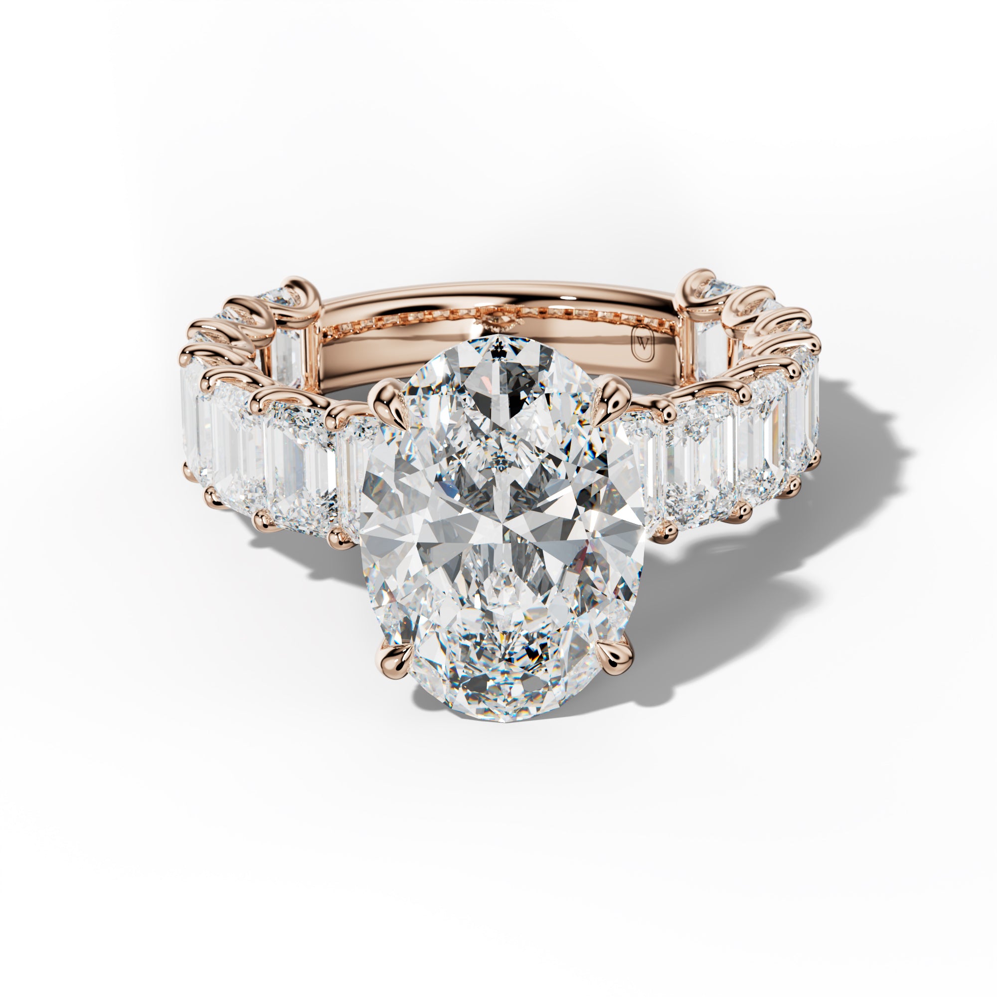 Vivienne Oval Diamond Engagement Ring With Emerald Side Stones