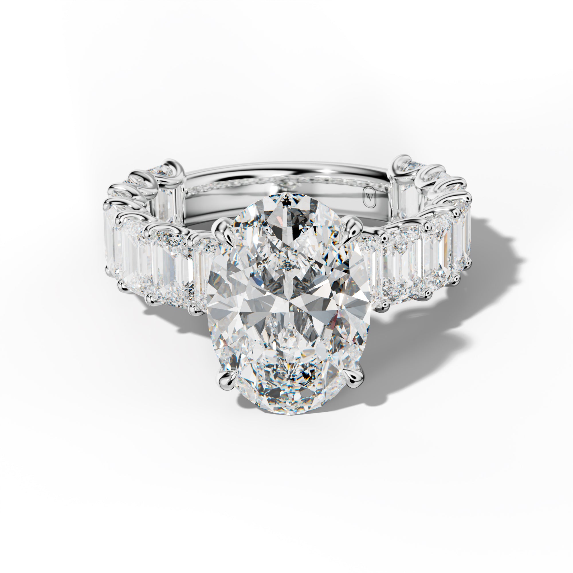 Vivienne Oval Diamond Engagement Ring With Emerald Side Stones