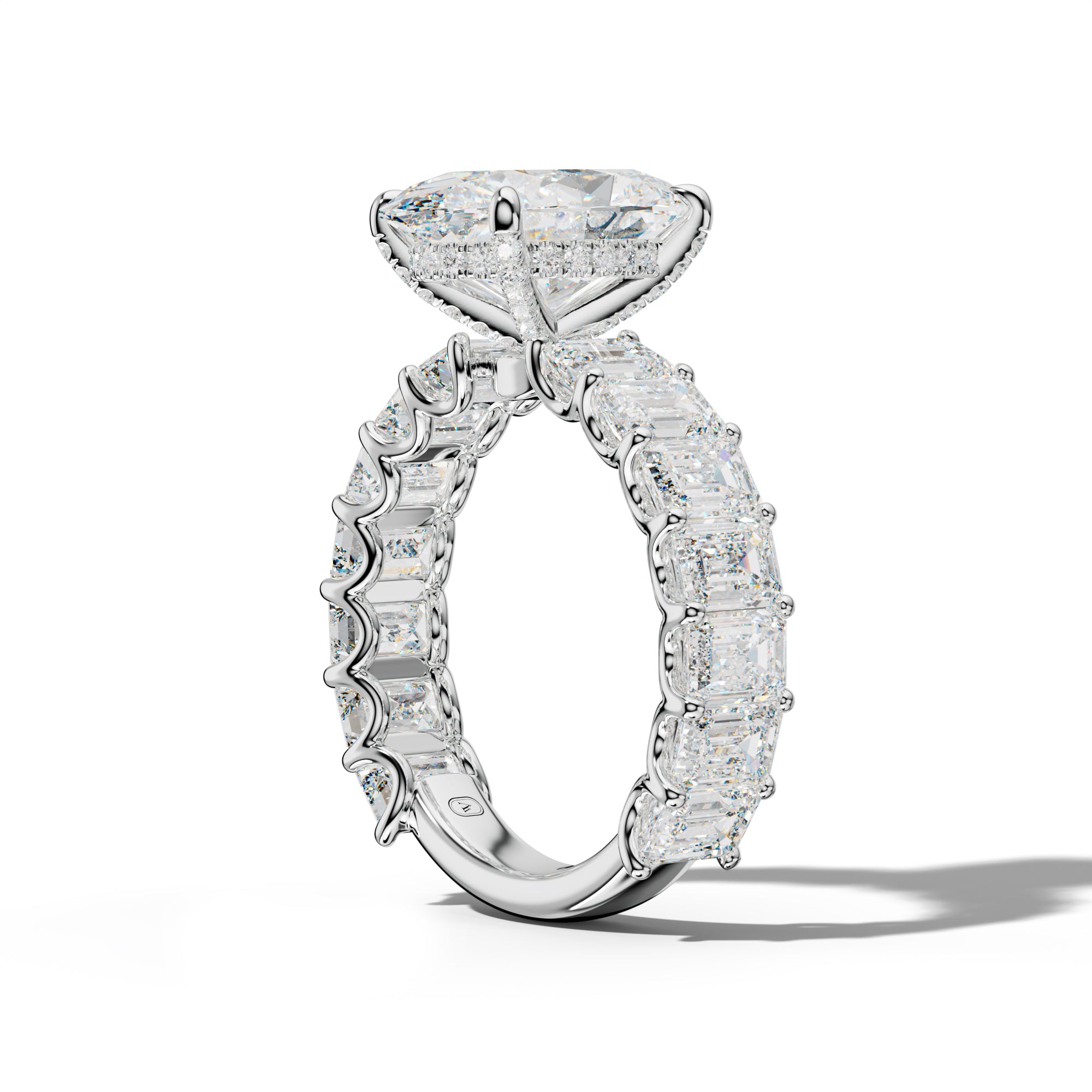 Vivienne Oval Diamond Engagement Ring With Emerald Side Stones