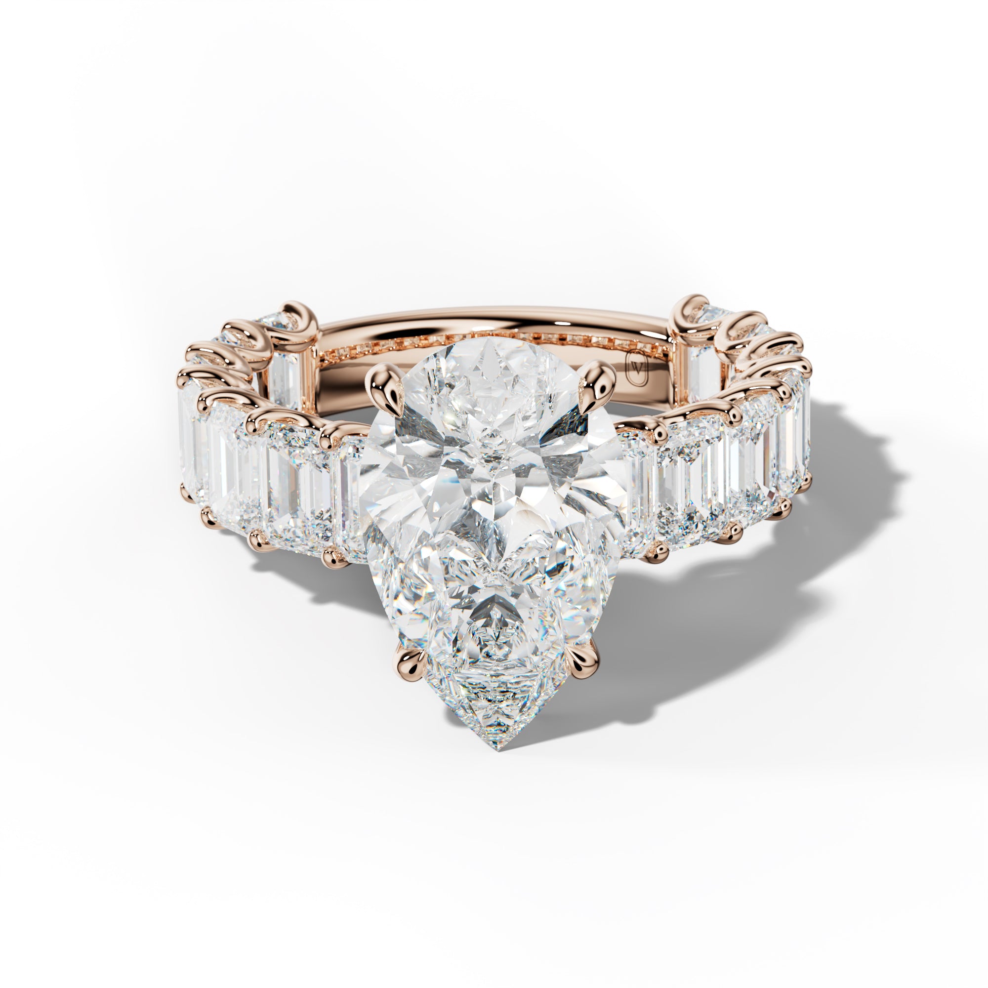 Vivienne Pear Shape Engagement Ring With Emerald Side Stones