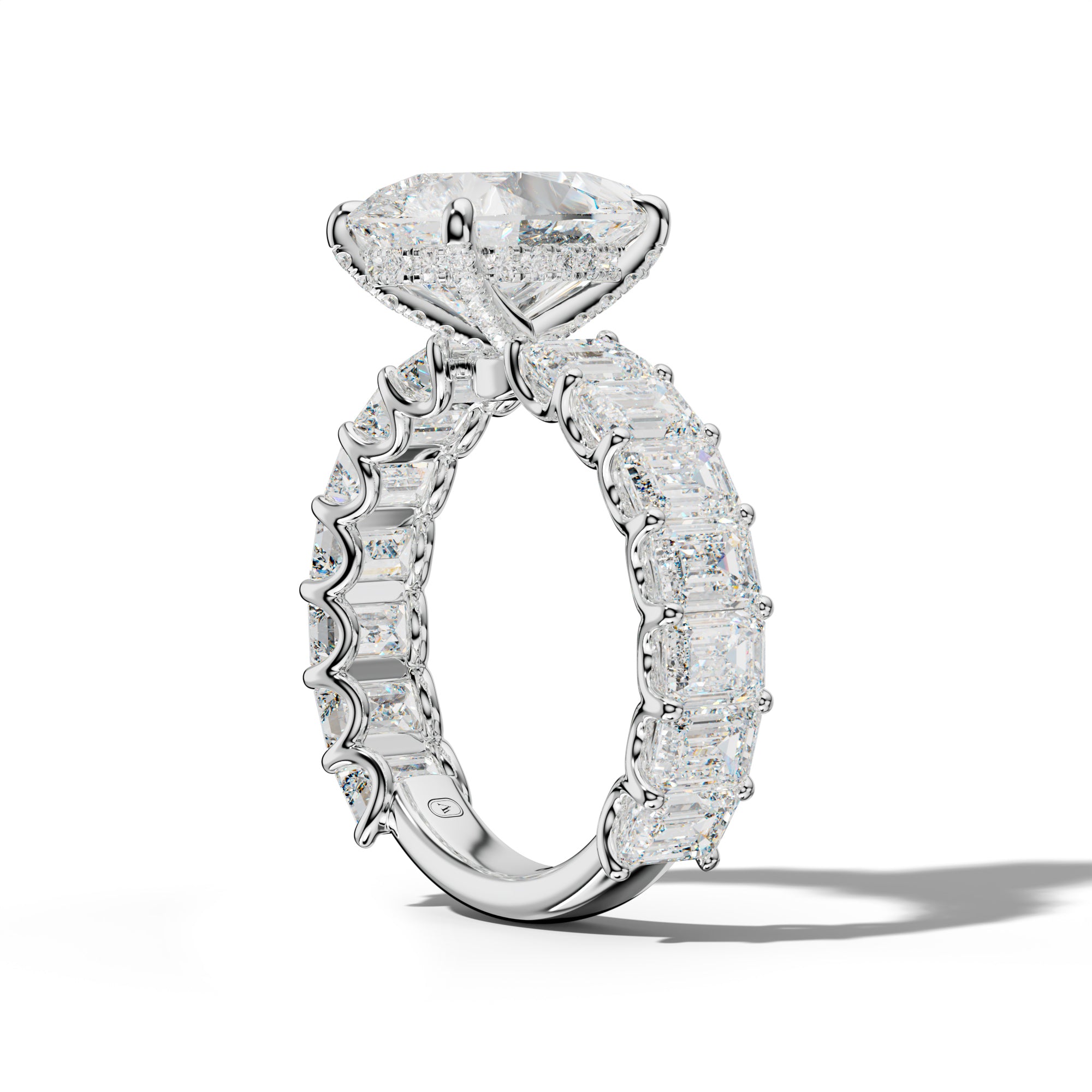 Vivienne Pear Shape Engagement Ring With Emerald Side Stones