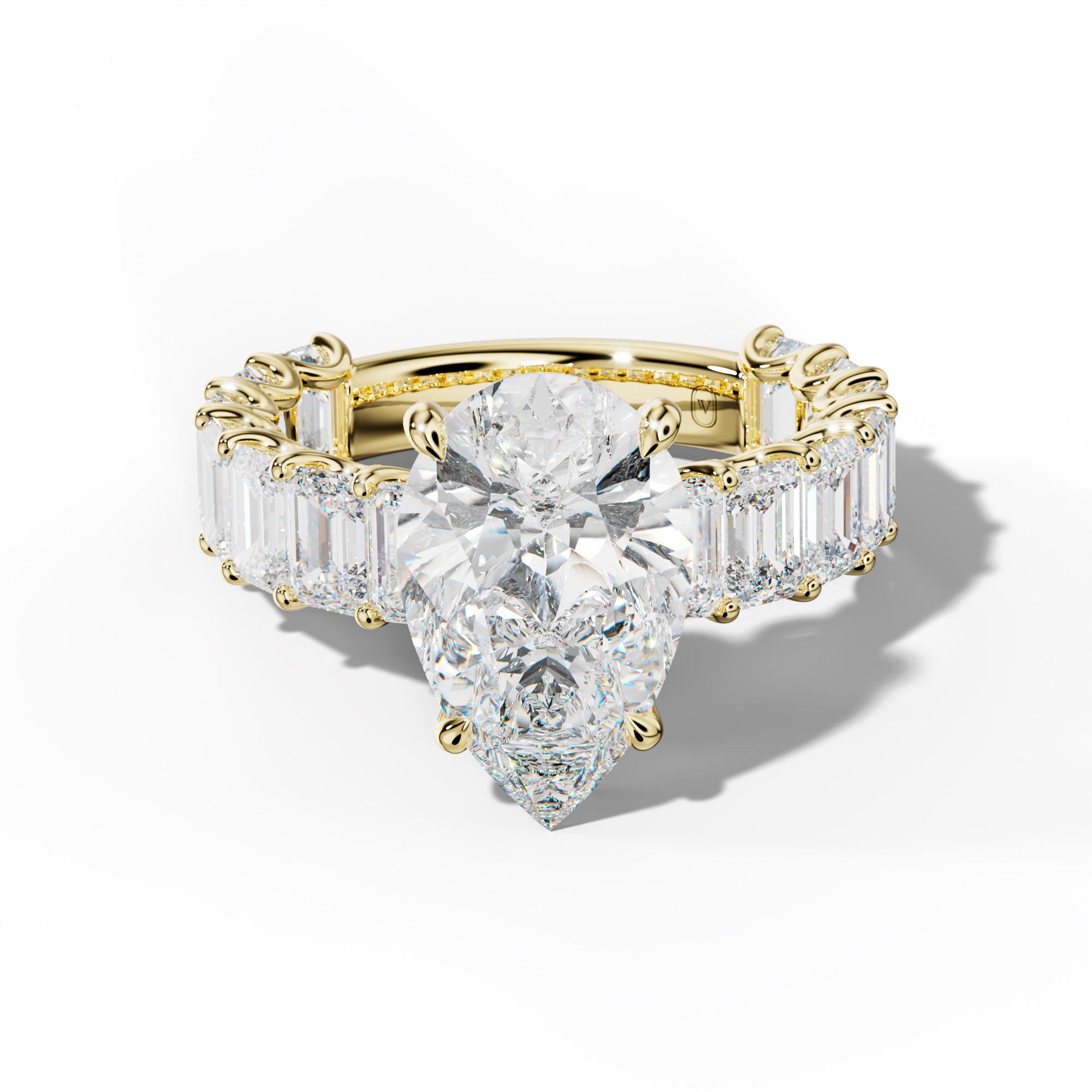 Vivienne Pear Shape Engagement Ring With Emerald Side Stones