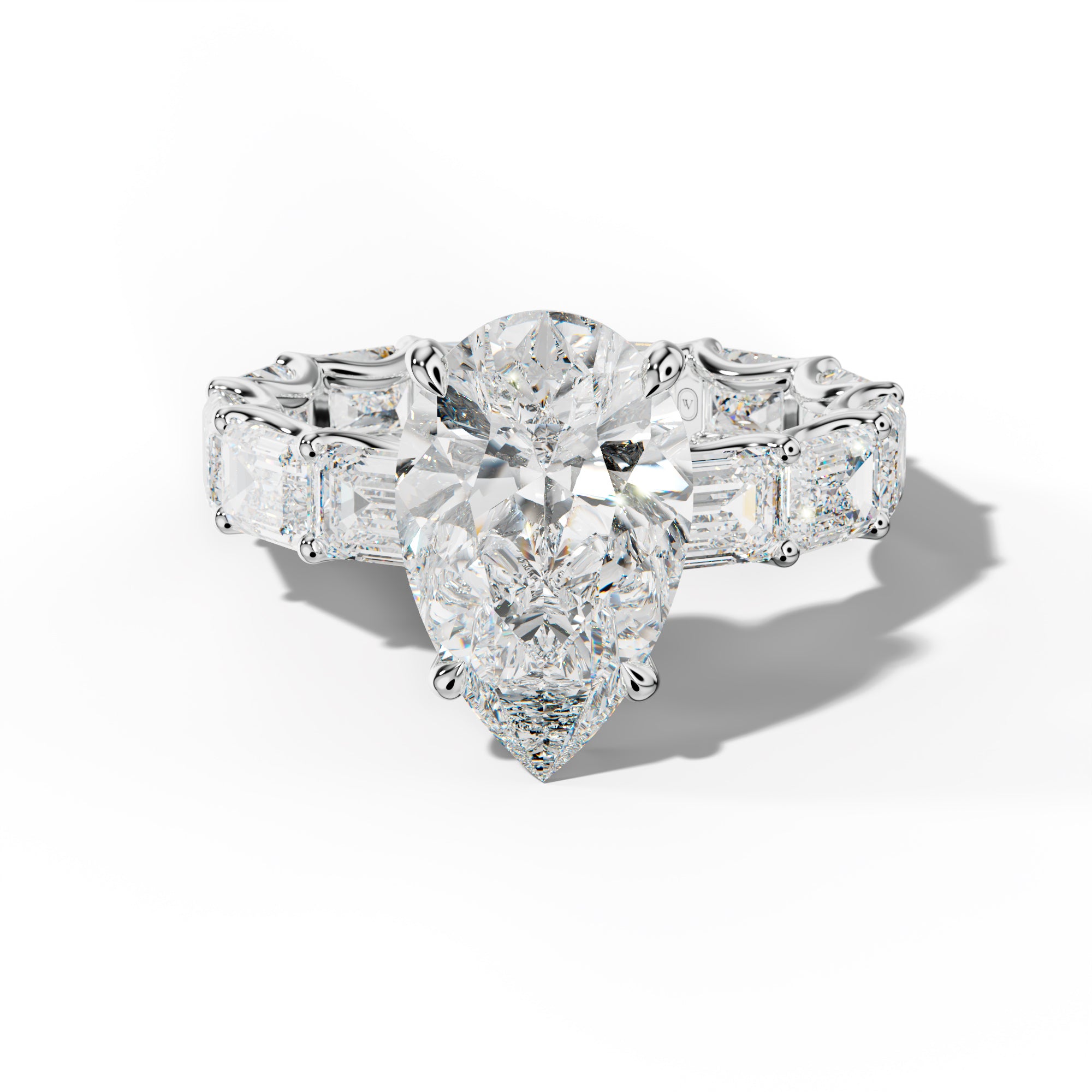 Tiffany Pear Shape Engagement Ring With East West Emerald Side Stones