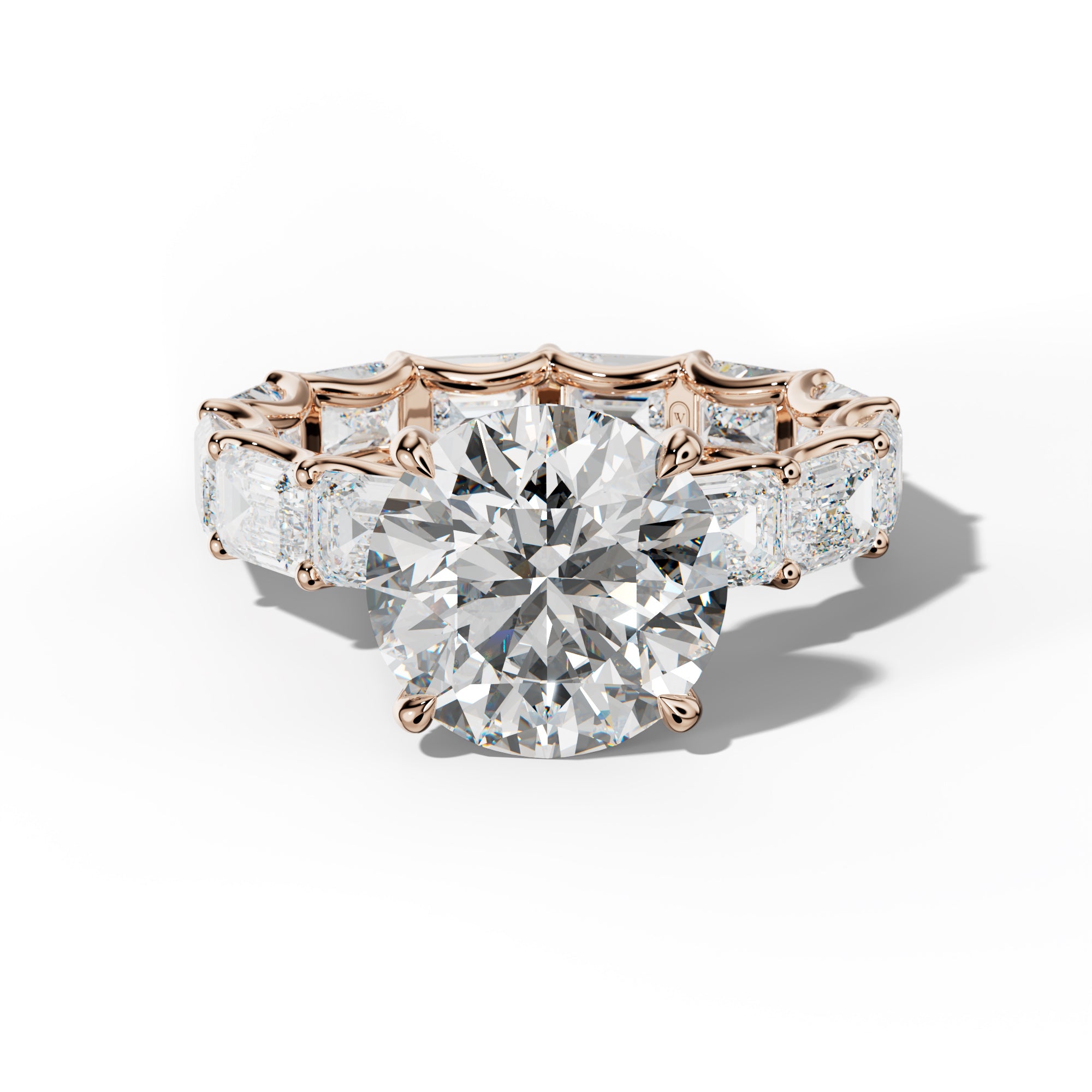 Tiffany Round Diamond Engagement Ring With East West Emerald Side Stones