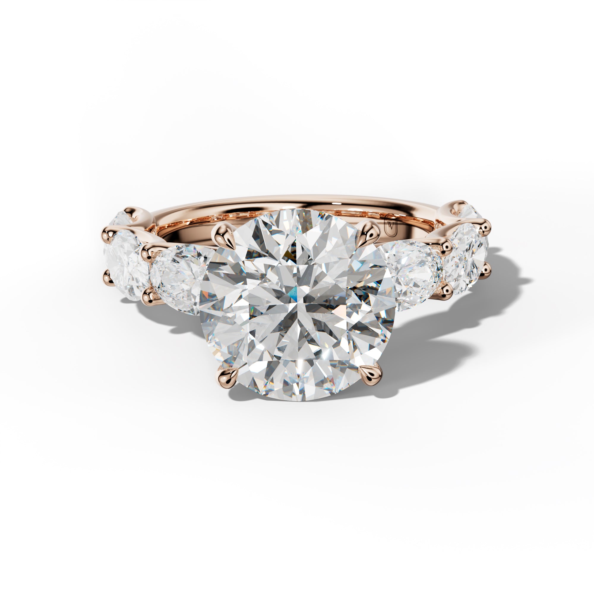 Kinsley Round Diamond Engagement Ring With East West Oval Side Stones