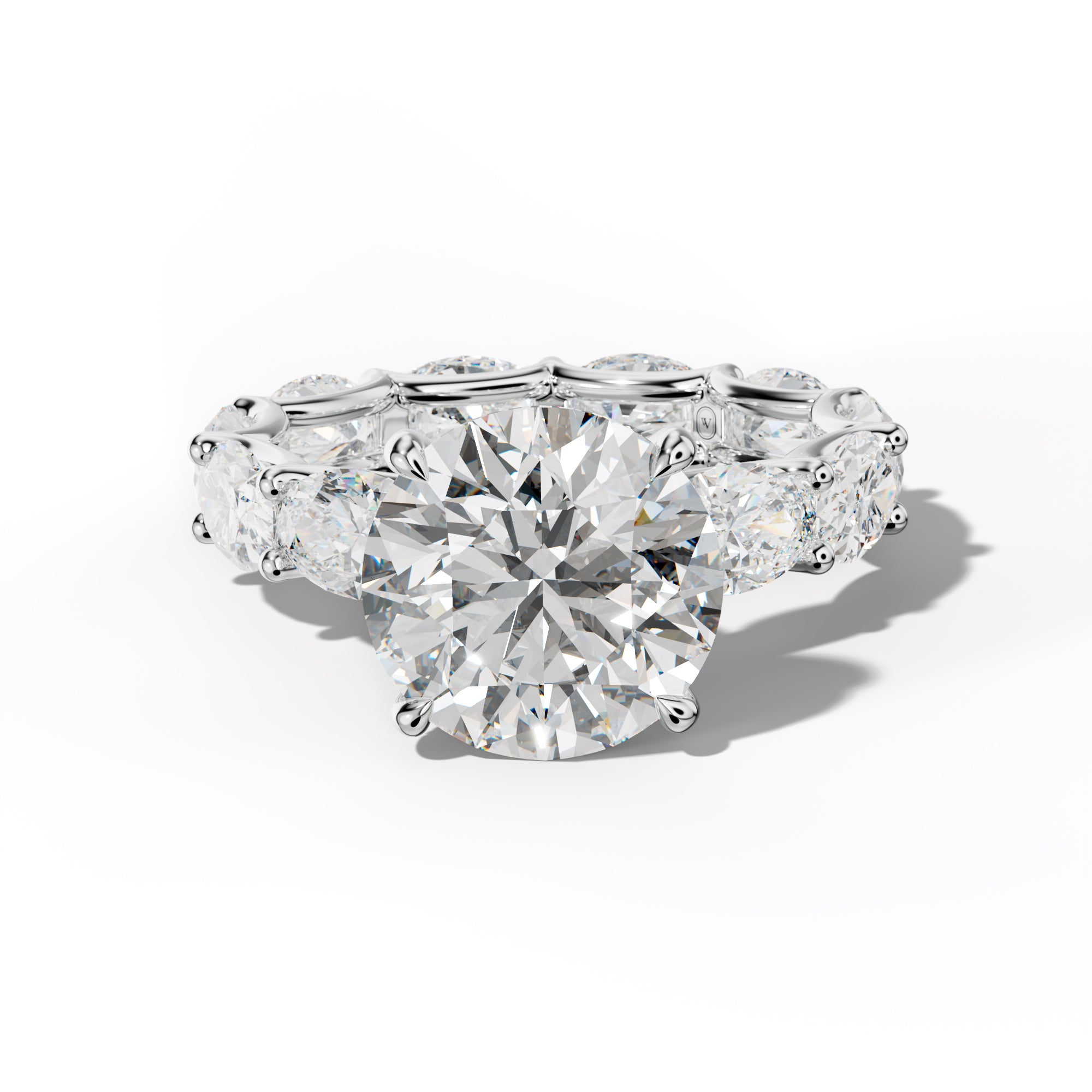Paisley Round Diamond Engagement Ring With East West Oval Side Stones