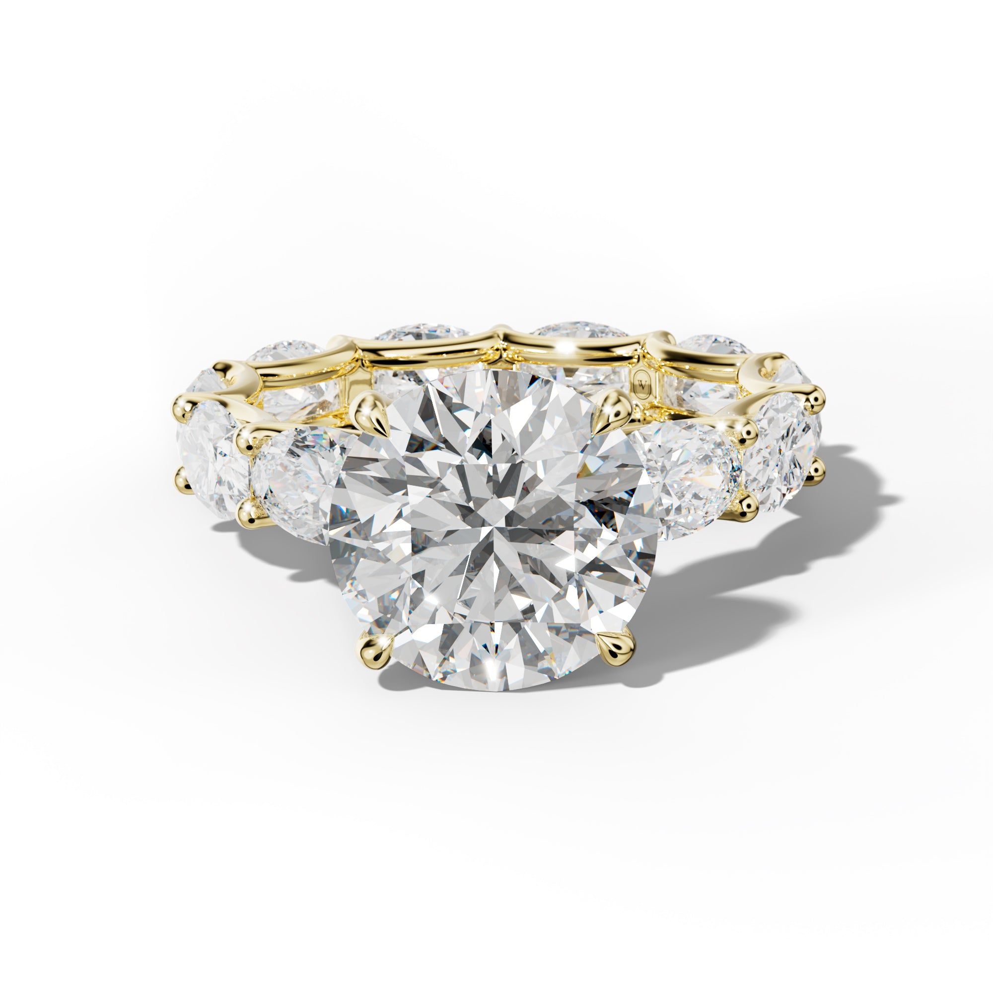 Paisley Round Diamond Engagement Ring With East West Oval Side Stones