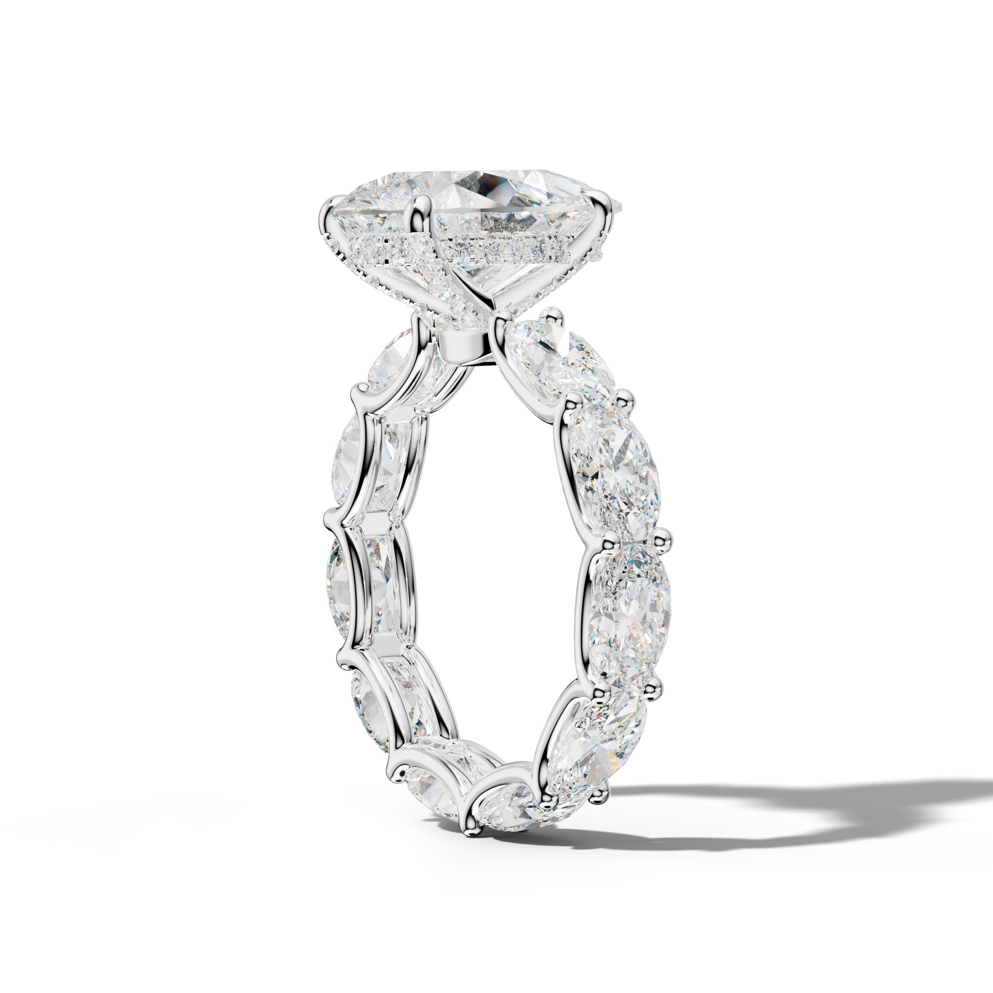 Paisley Pear Shape Diamond Engagement Ring With East West Oval Side Stones