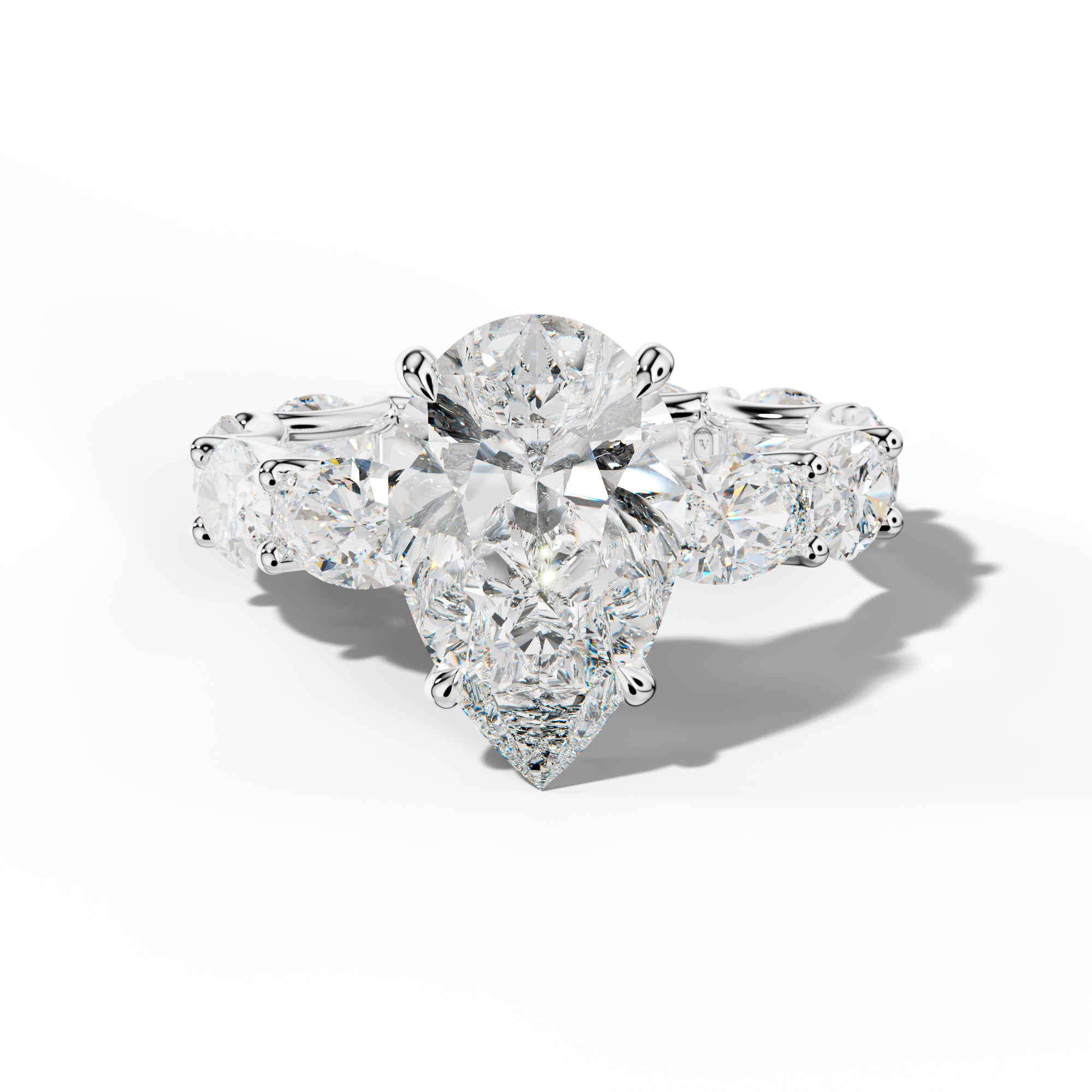 Paisley Pear Shape Diamond Engagement Ring With East West Oval Side Stones