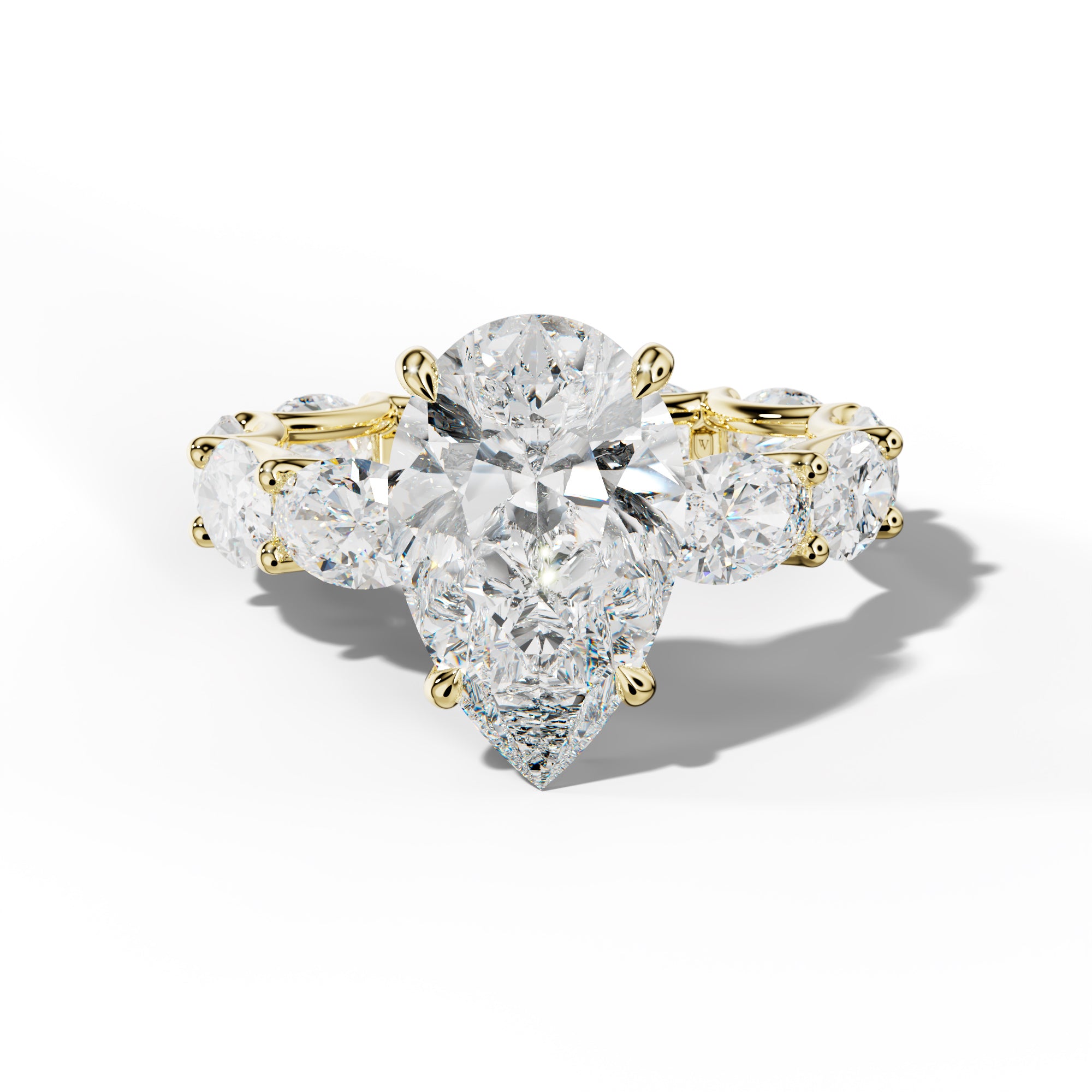 Paisley Pear Shape Diamond Engagement Ring With East West Oval Side Stones