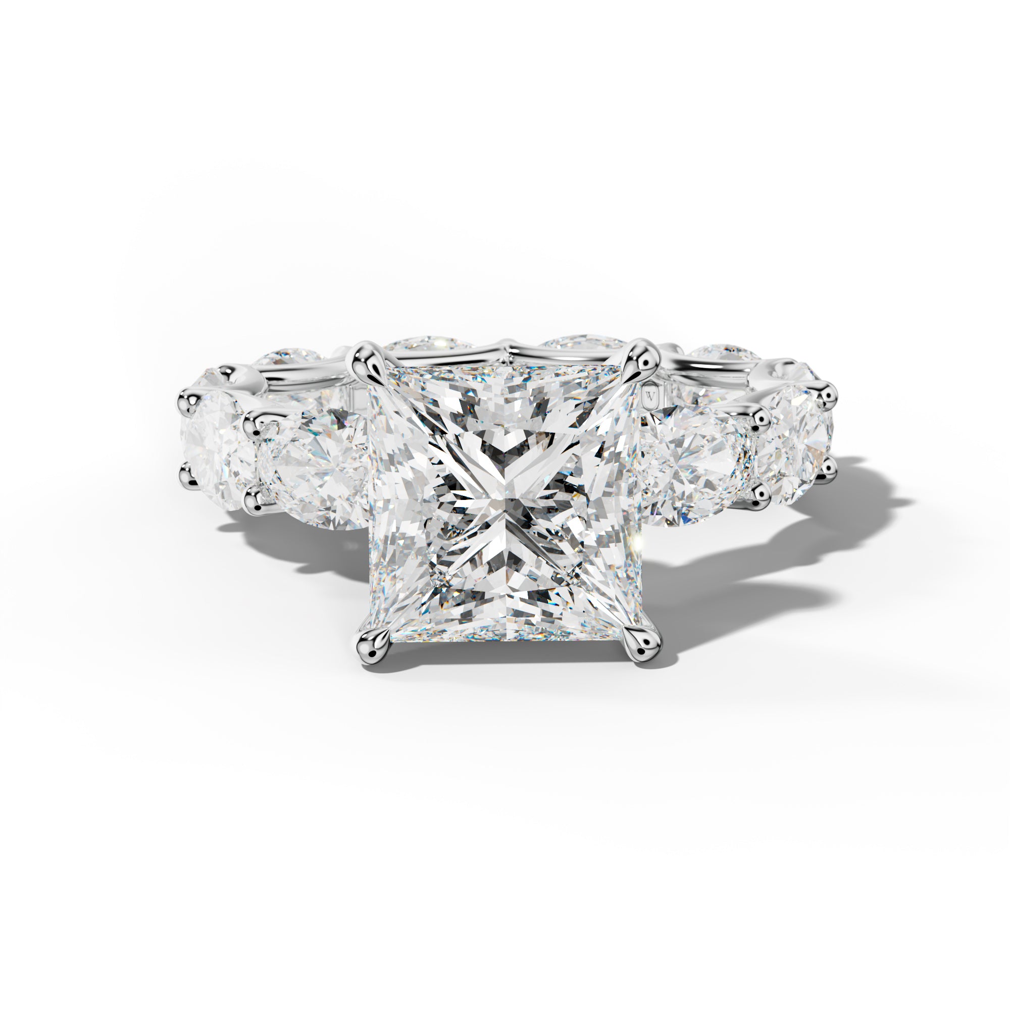 Paisley Princess Cut Engagement Ring With East West Oval Side Stones