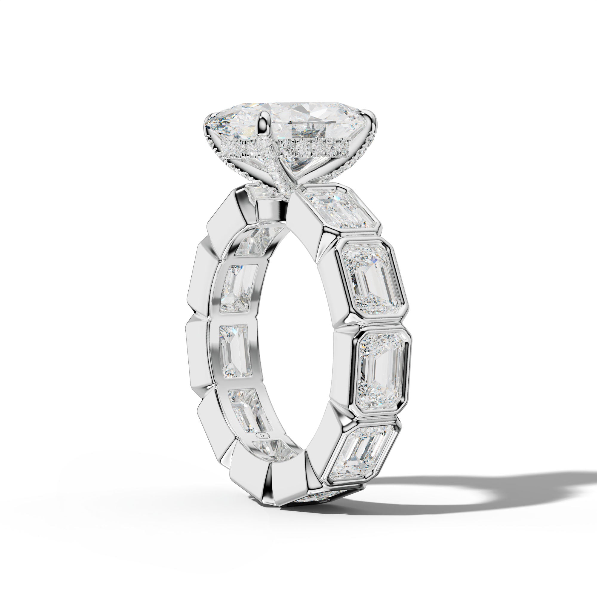 Violeta Oval Diamond Engagement Ring With East West Emerald Side Stones