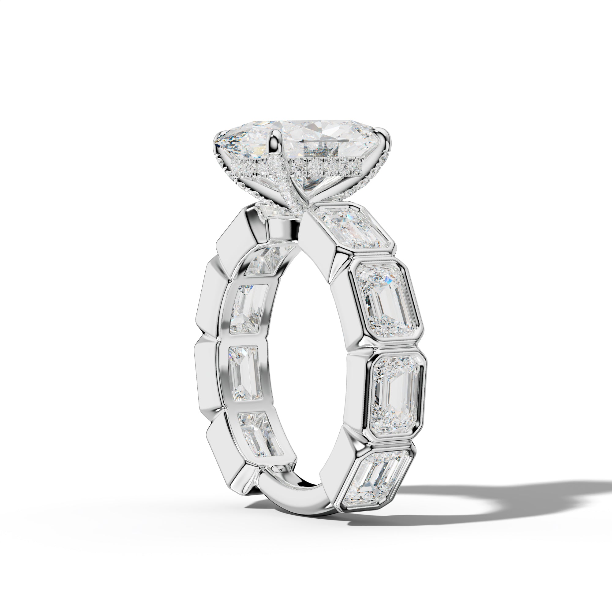 Jessie Oval Diamond Engagement Ring With East West Emerald Side Stones