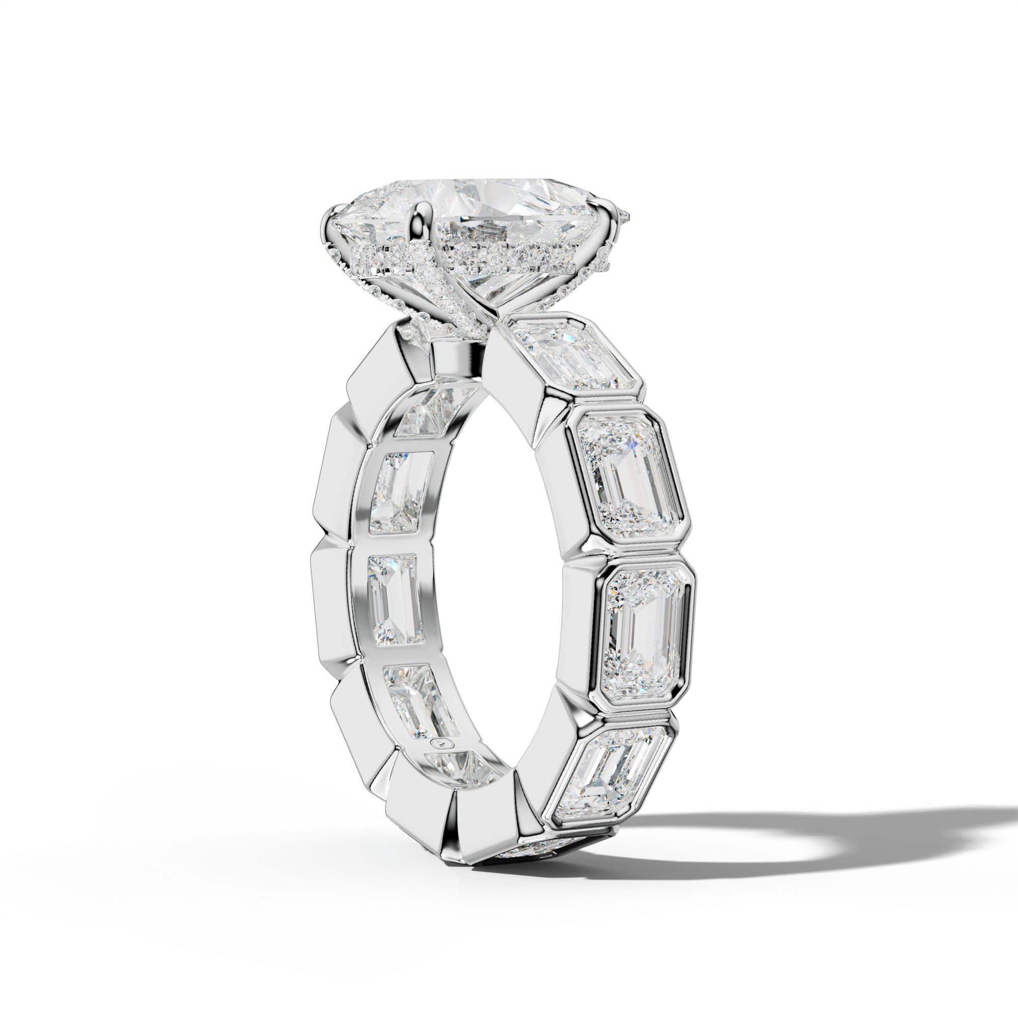 Violeta Pear Shape Engagement Ring With East West Emerald Side Stones