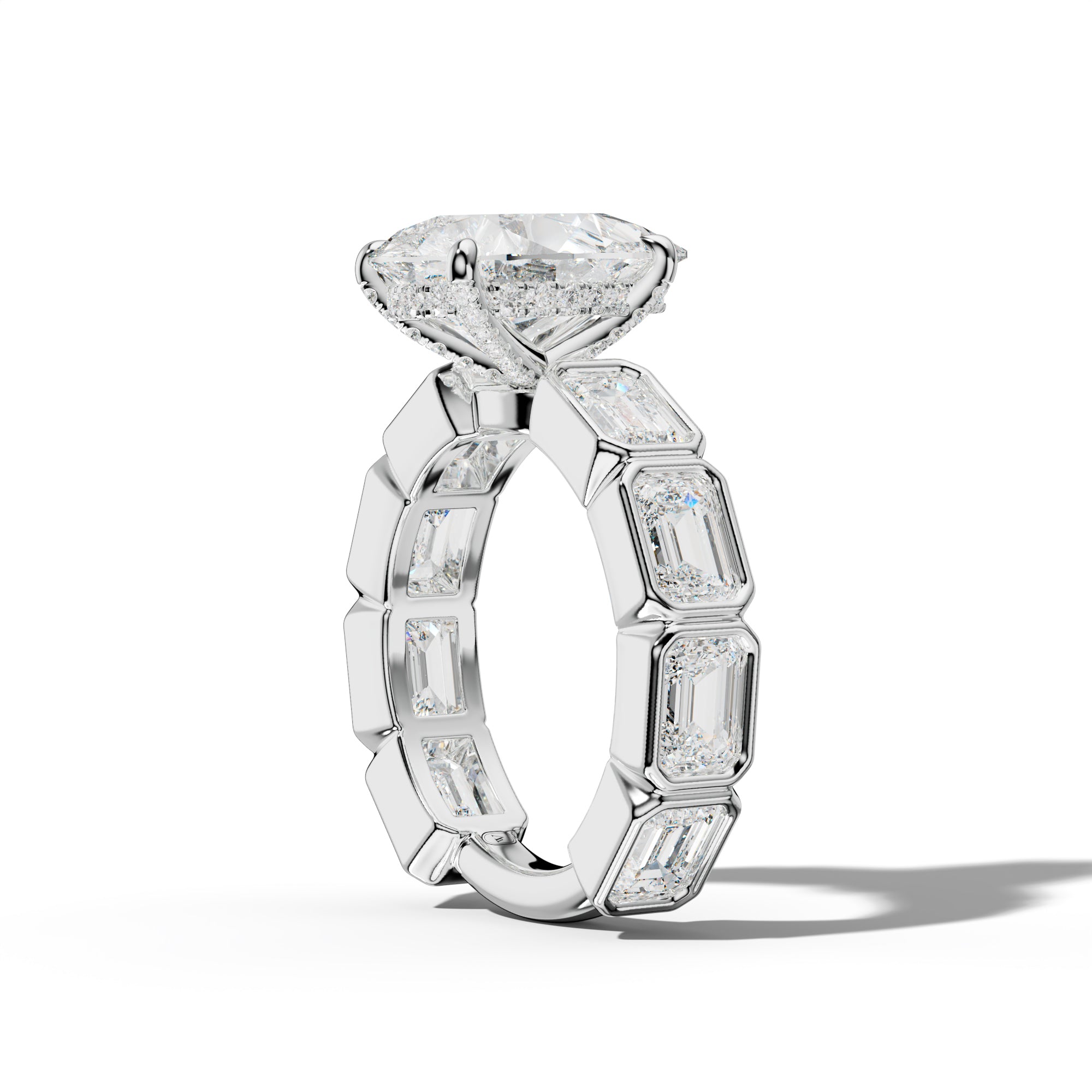 Jessie Pear Shape Engagement Ring With East West Emerald Side Stones