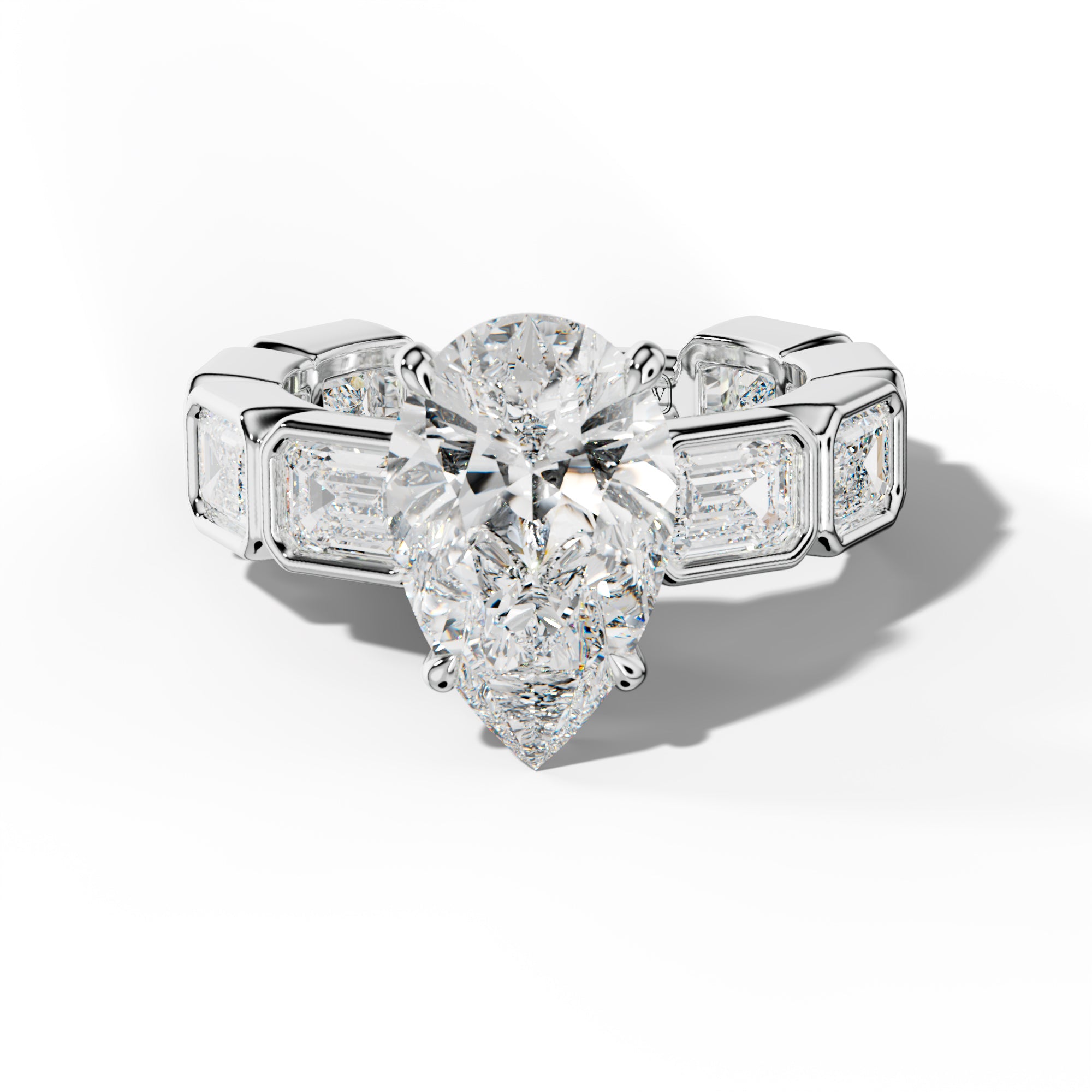 Jessie Pear Shape Engagement Ring With East West Emerald Side Stones