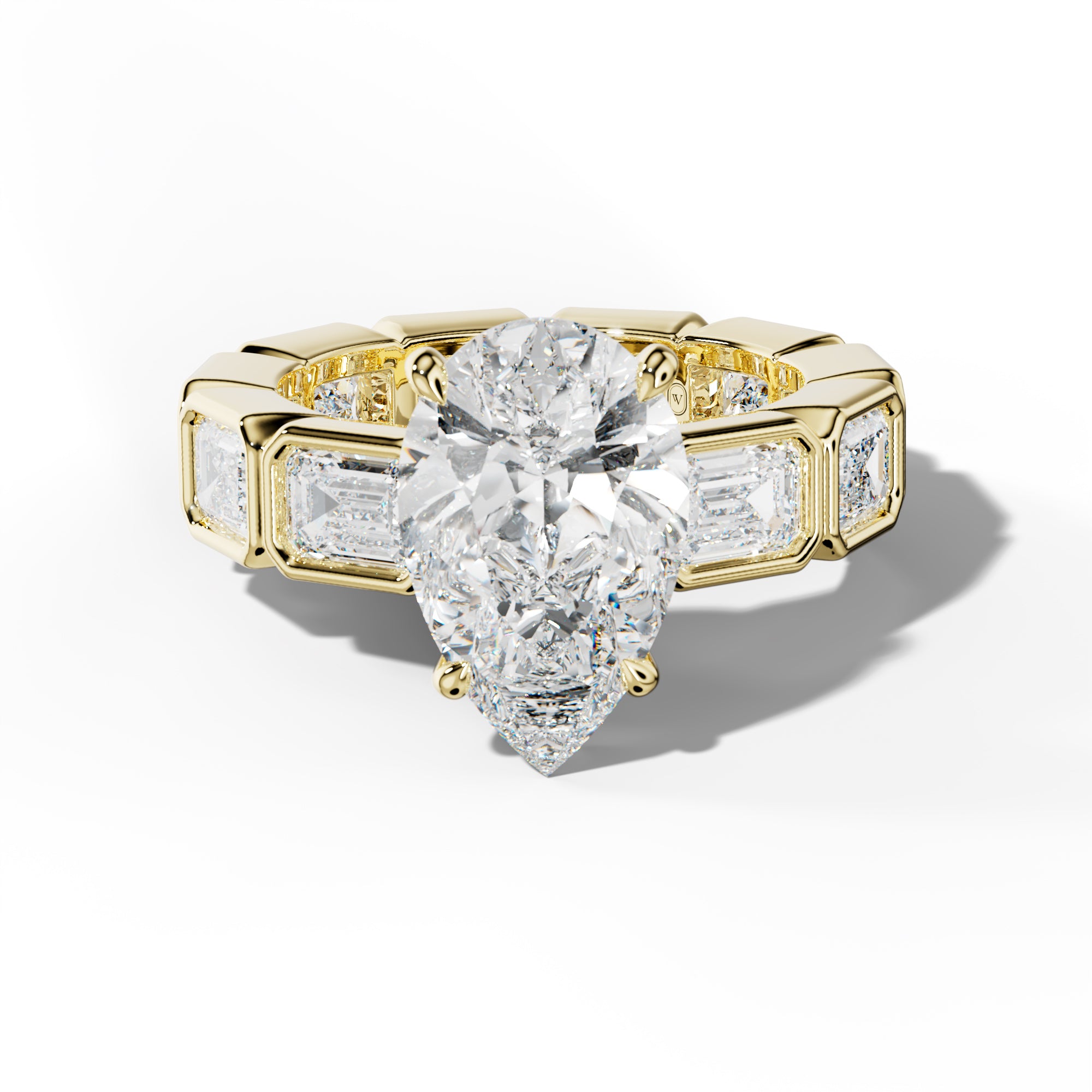 Violeta Pear Shape Engagement Ring With East West Emerald Side Stones