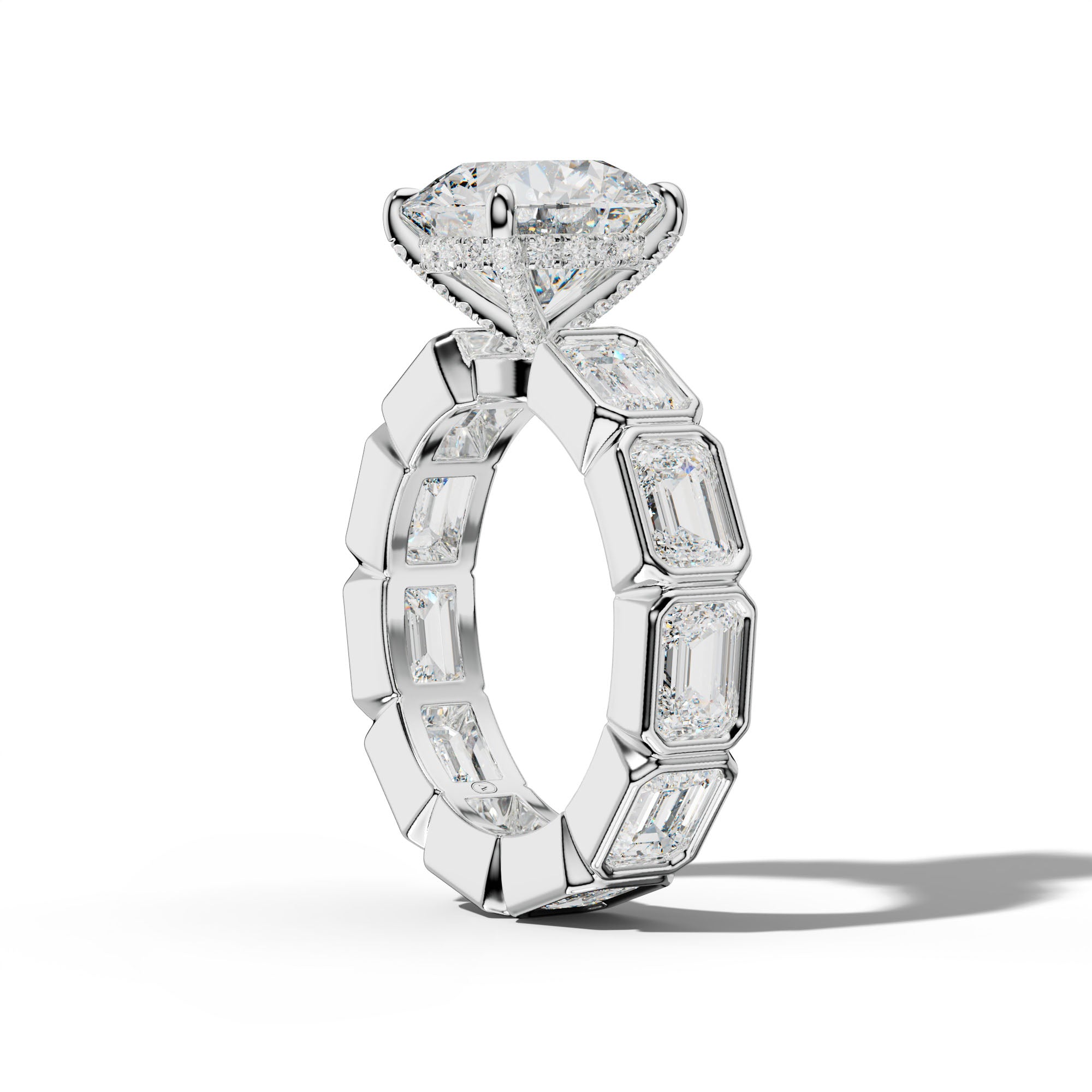 Violeta Round Diamond Engagement Ring With East West Emerald Side Stones