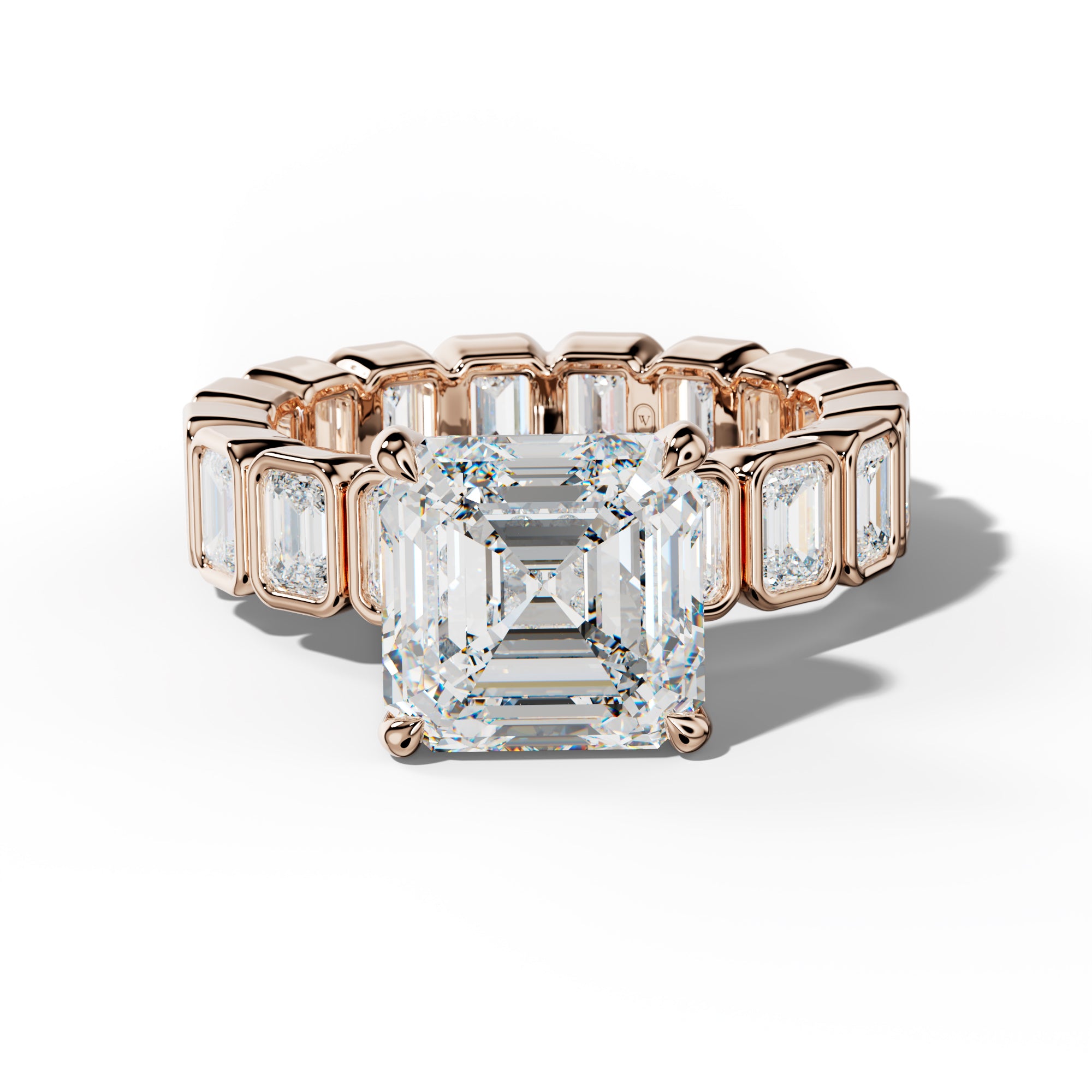 Palmer Asscher Diamond Engagement Ring With Emerald Side Stones