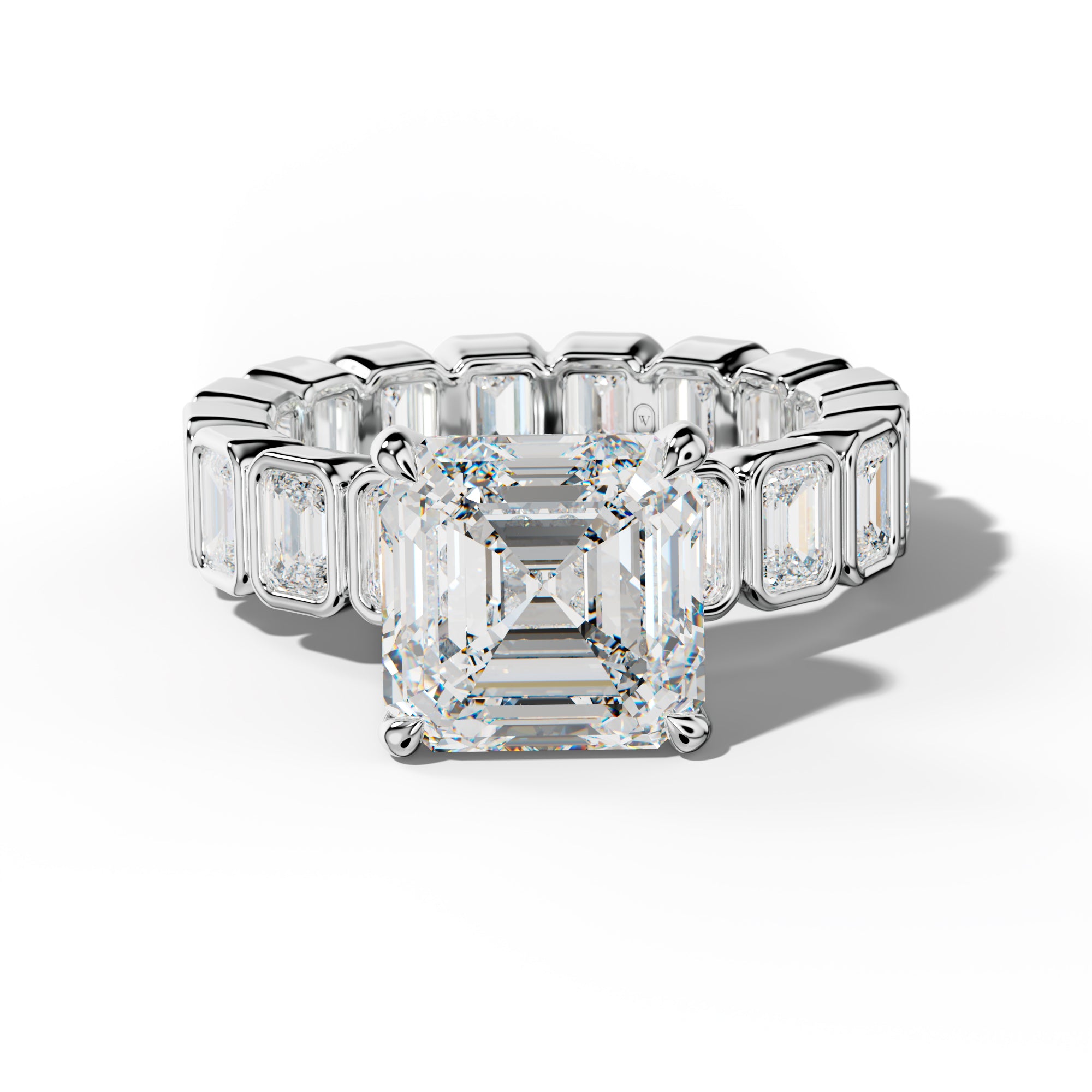 Palmer Asscher Diamond Engagement Ring With Emerald Side Stones