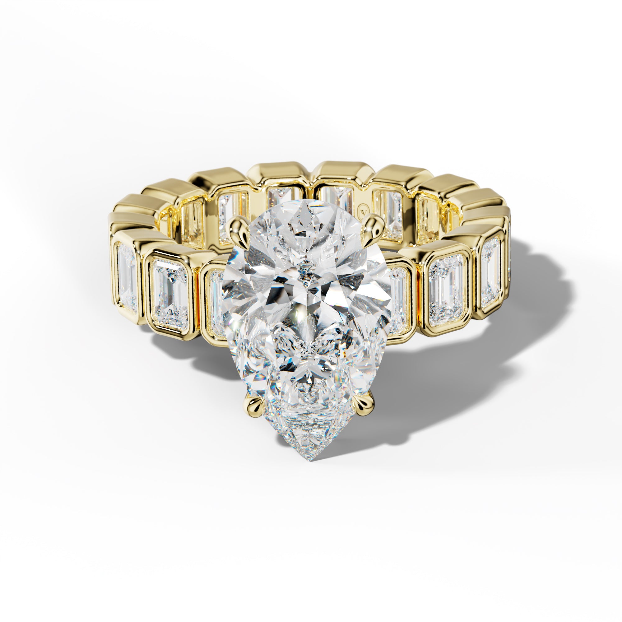 Palmer Pear Shape Engagement Ring With Emerald Side Stones