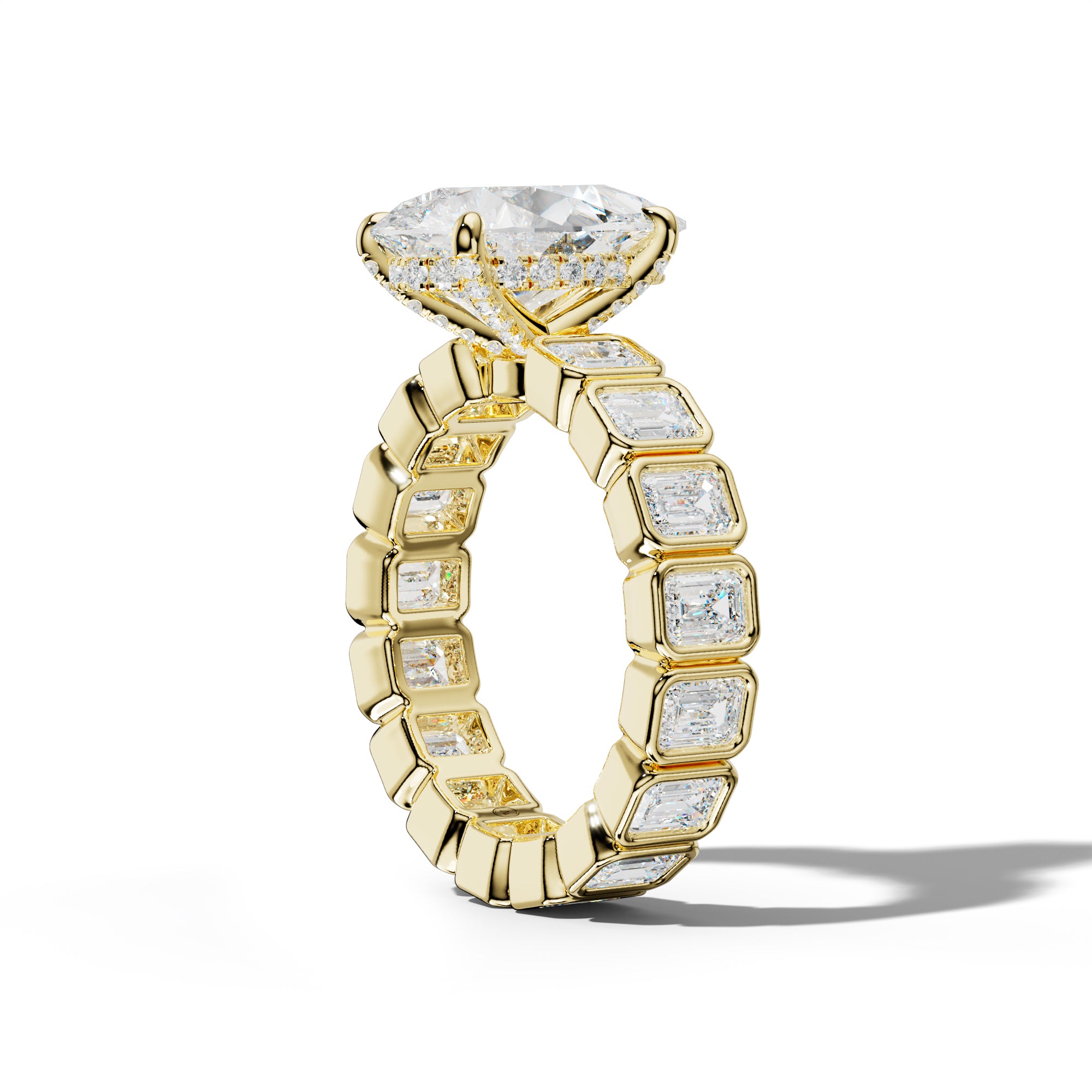 Palmer Pear Shape Engagement Ring With Emerald Side Stones