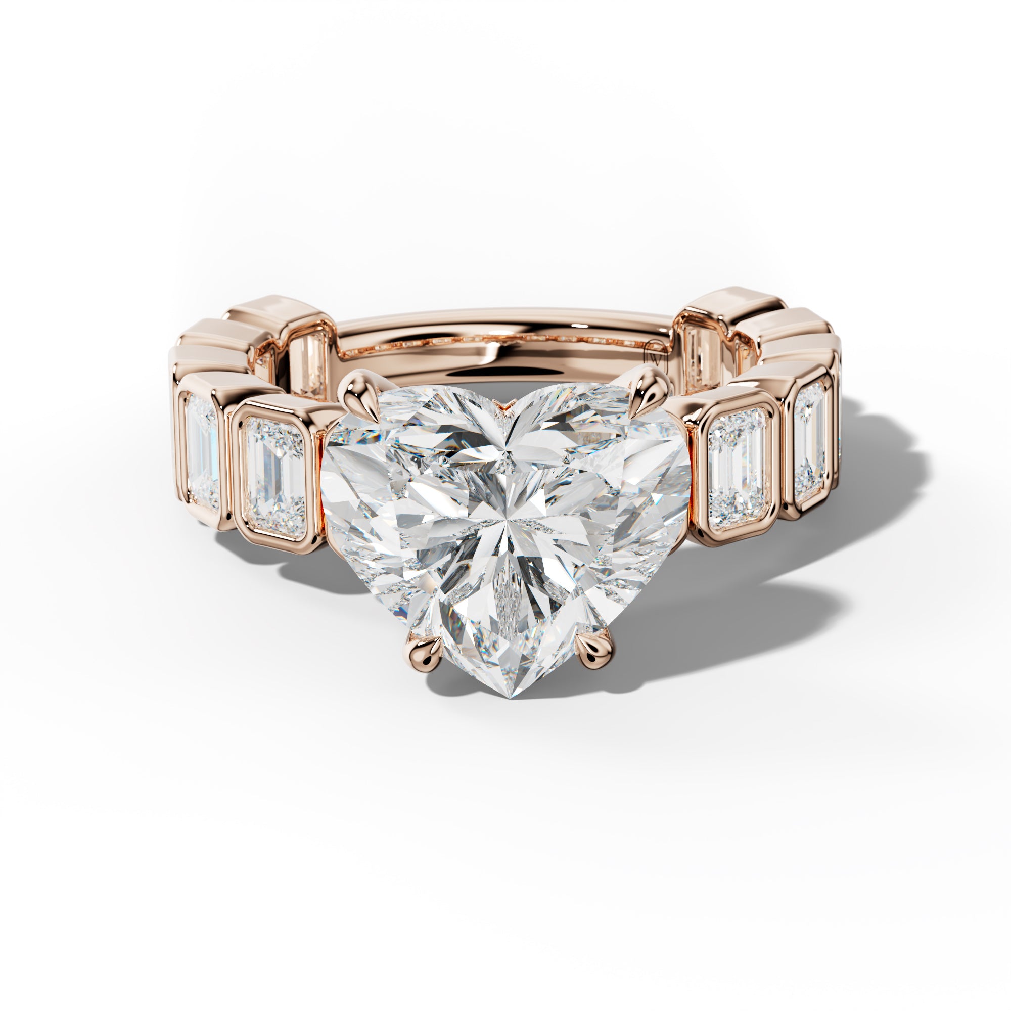 Maizie Heart Diamond Engagement Ring With Emerald Side Stones