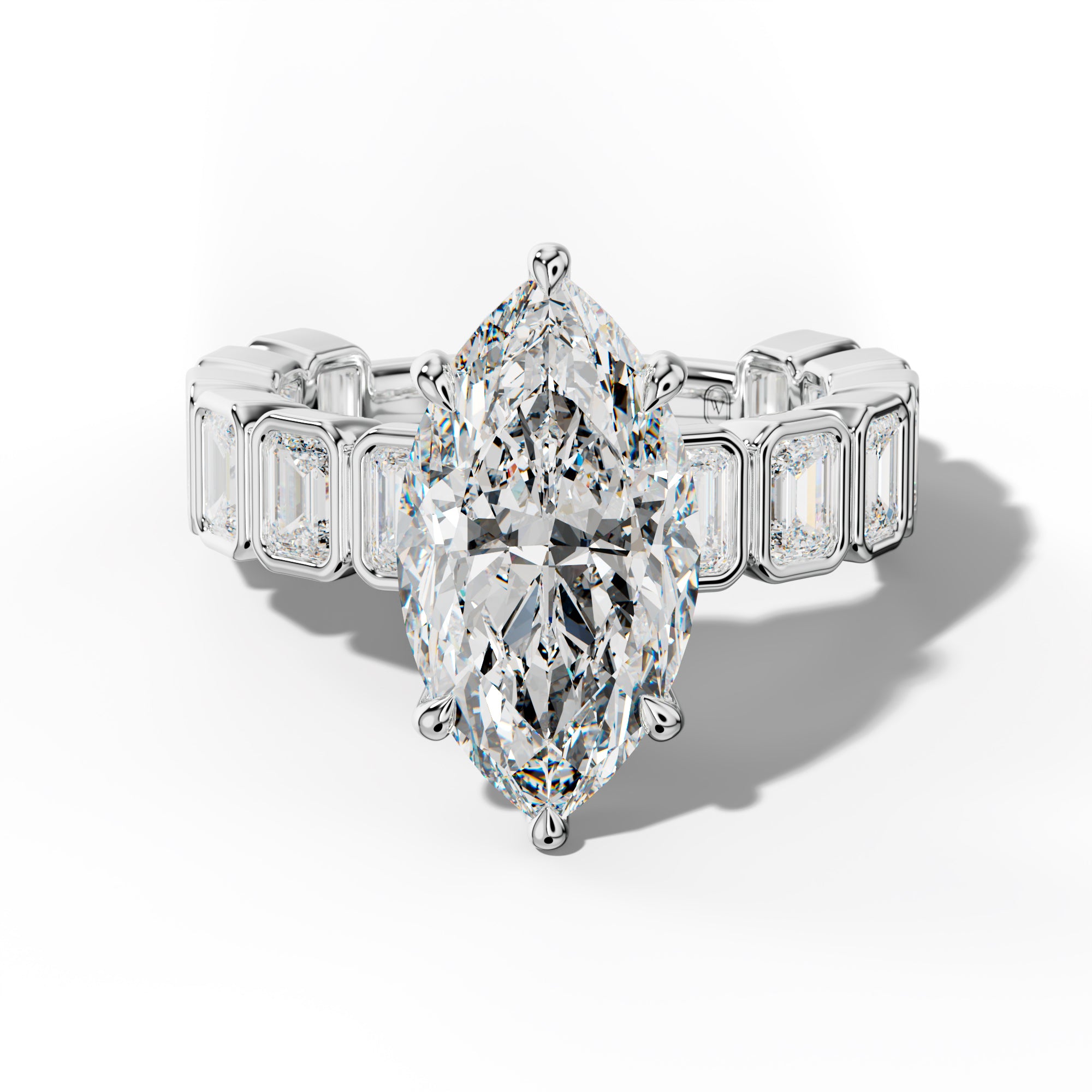 Maizie Marquise Diamond Engagement Ring With Emerald Side Stones
