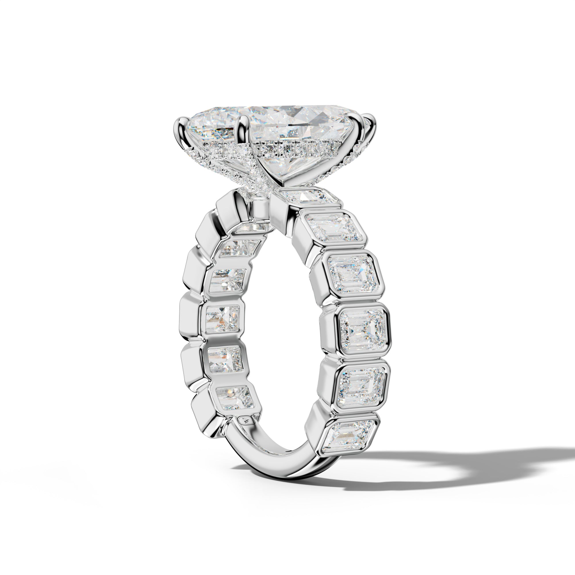 Maizie Marquise Diamond Engagement Ring With Emerald Side Stones