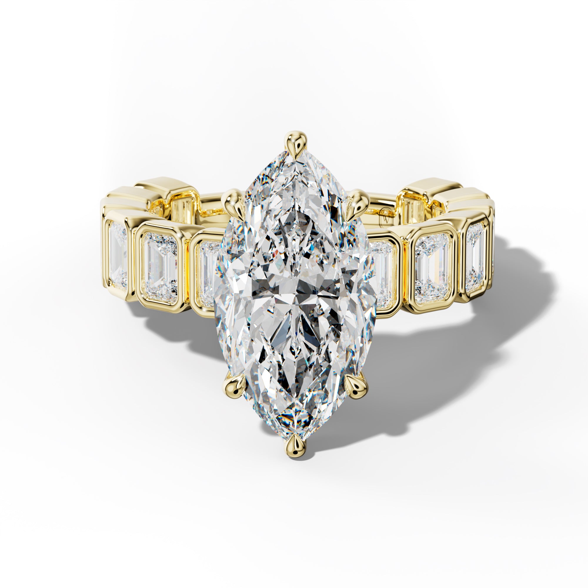 Maizie Marquise Diamond Engagement Ring With Emerald Side Stones
