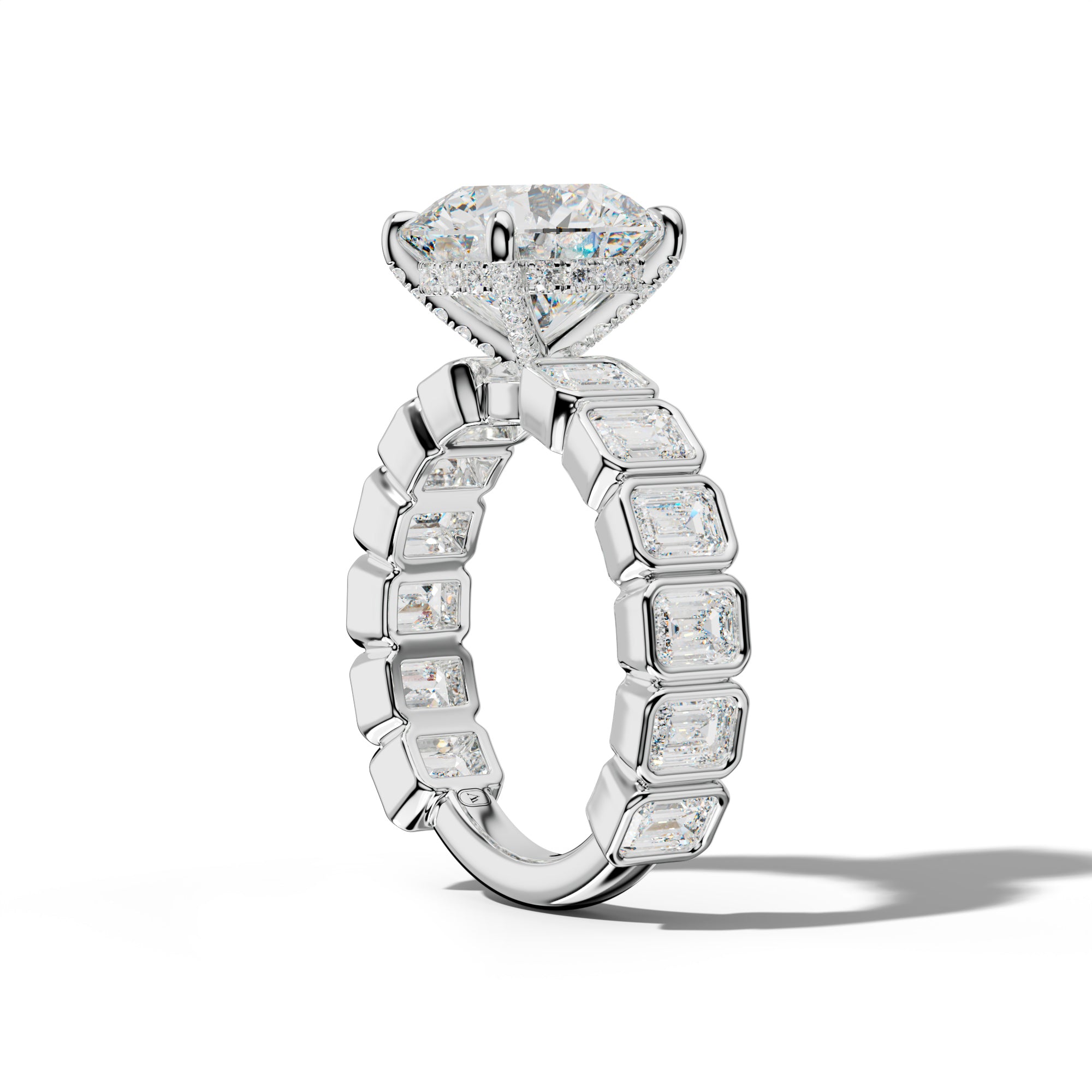 Maizie Round Diamond Engagement Ring With Emerald Side Stones