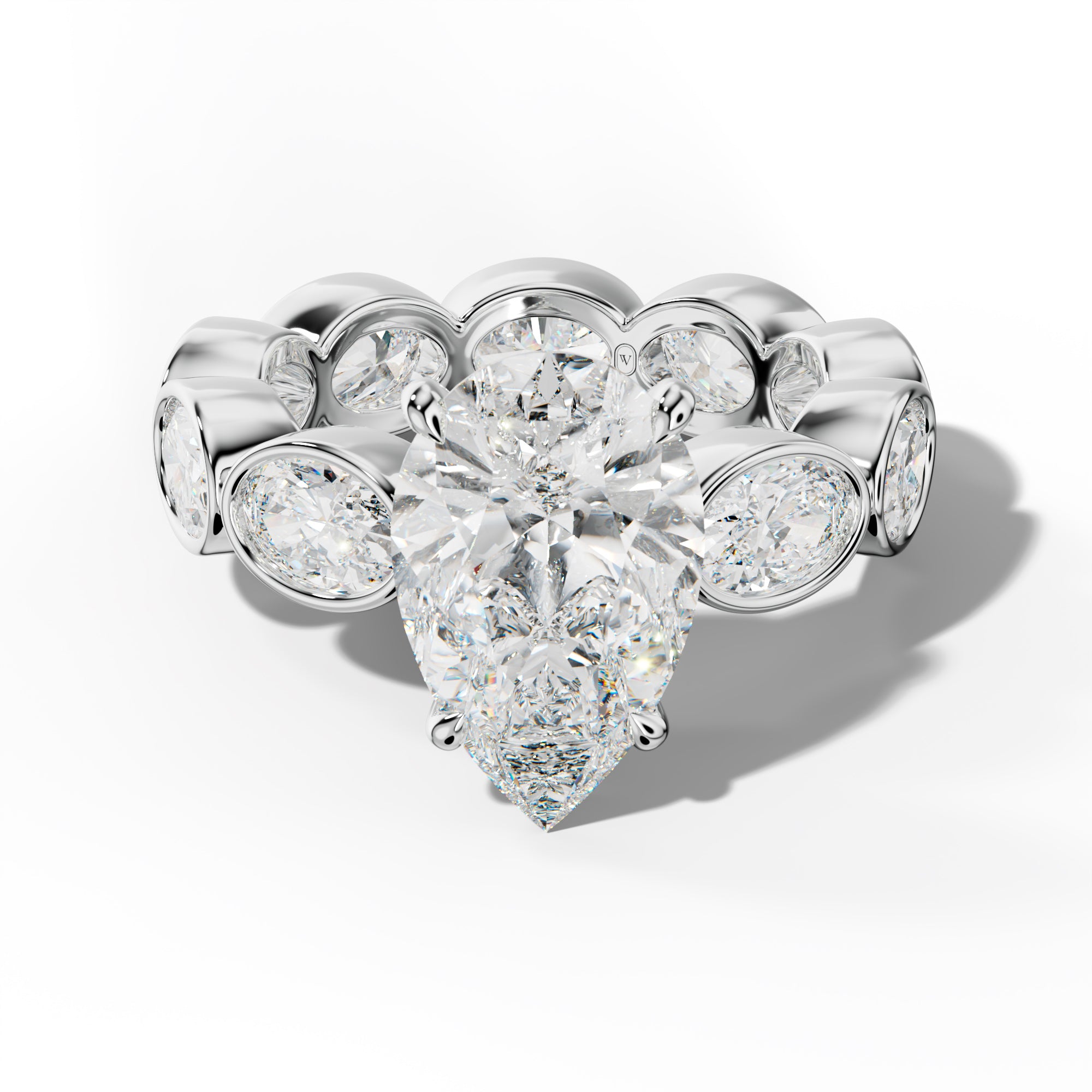 Veda Pear Shape Engagement Ring With East West Oval Side Stones