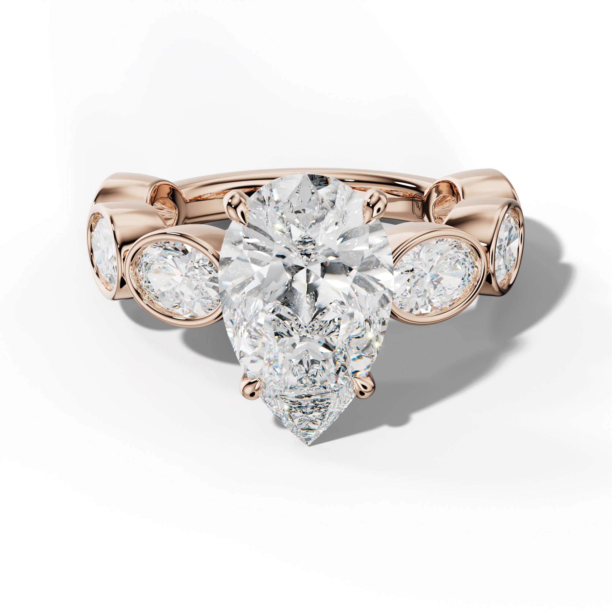 Leilani Pear Shape Engagement Ring With East West Oval Side Stones